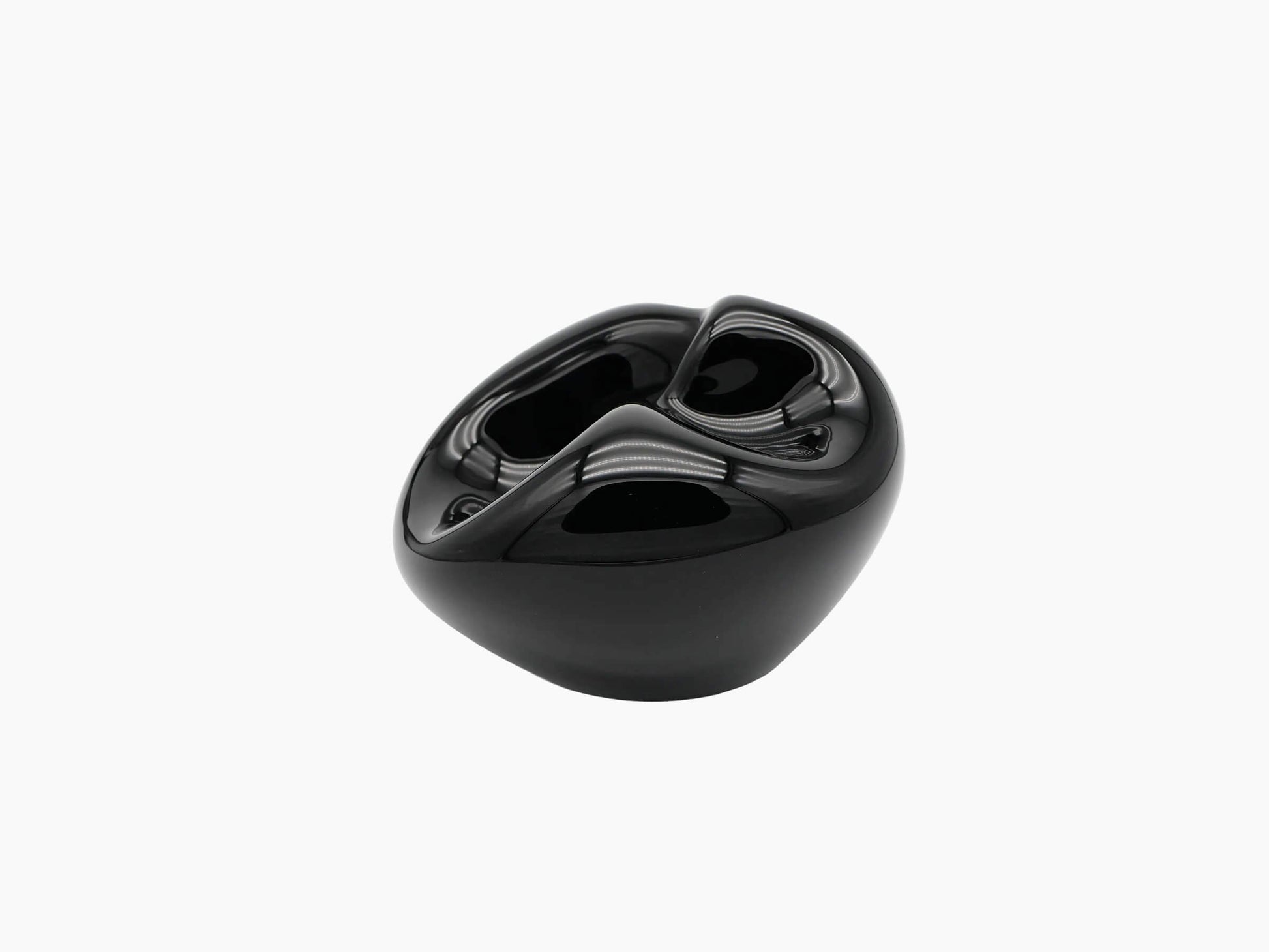 Hand blown Vessel Large in obsidian black with a rounded sculptural shape and a twisted glossy interior opening