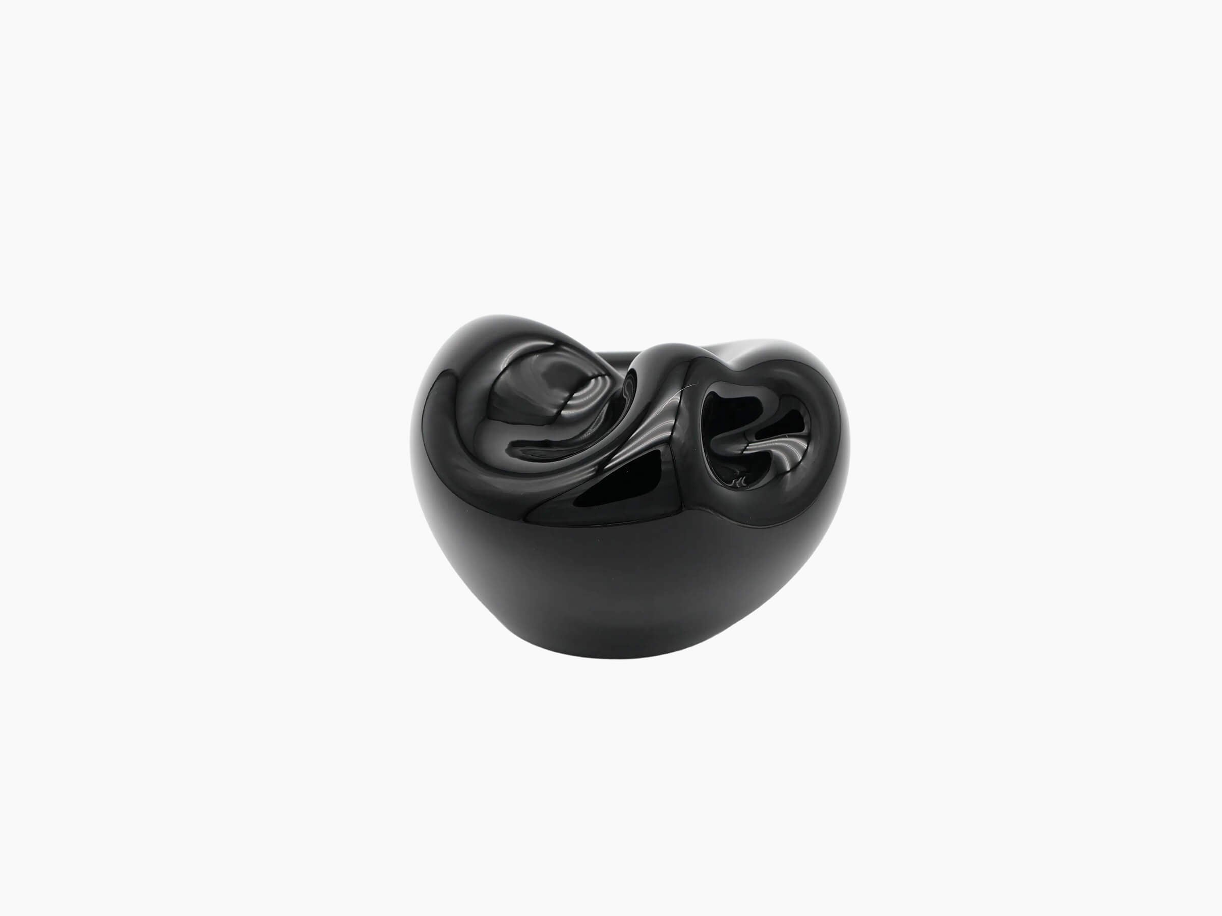 Obsidian Black Vessel Large showing a smooth glossy surface and organic sculptural silhouette