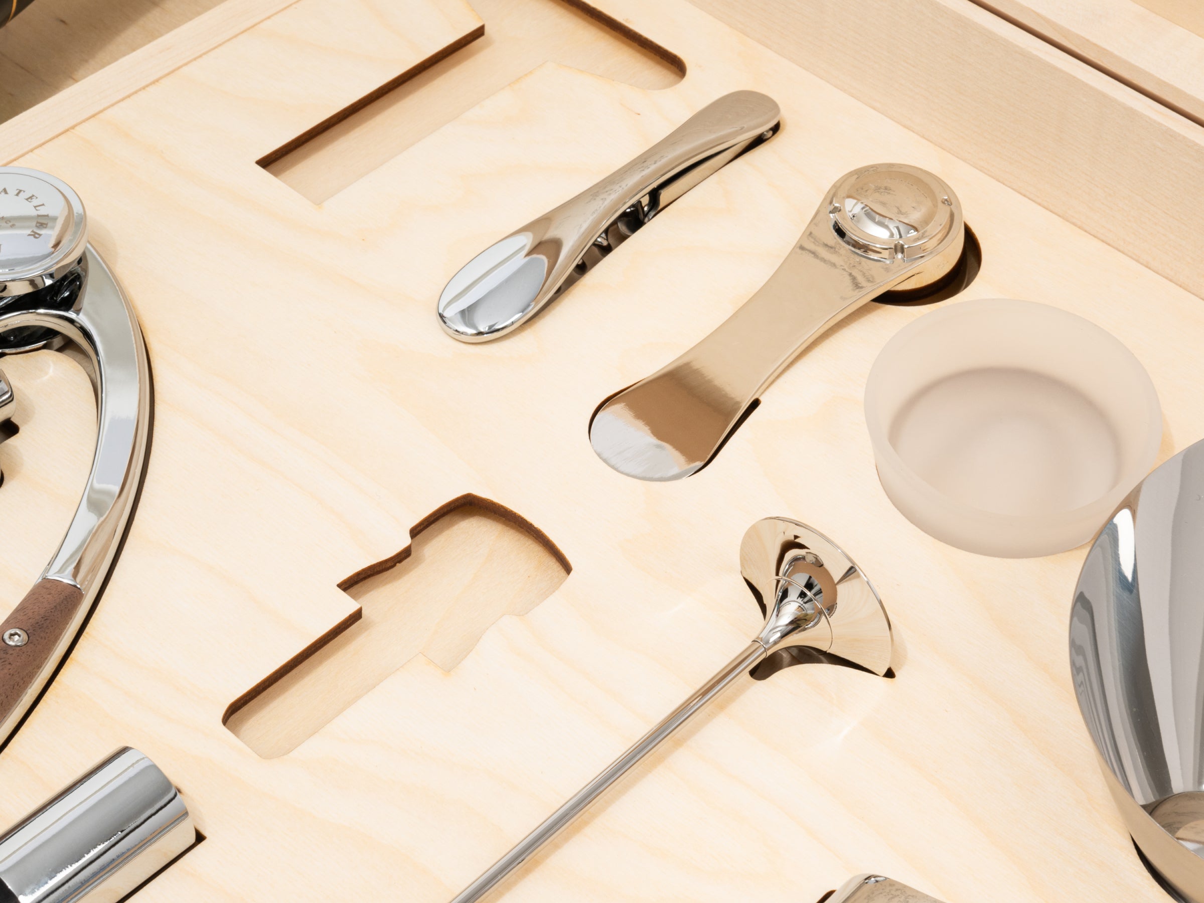 Rectangular light wood box with a front curved notch and a smooth finish.