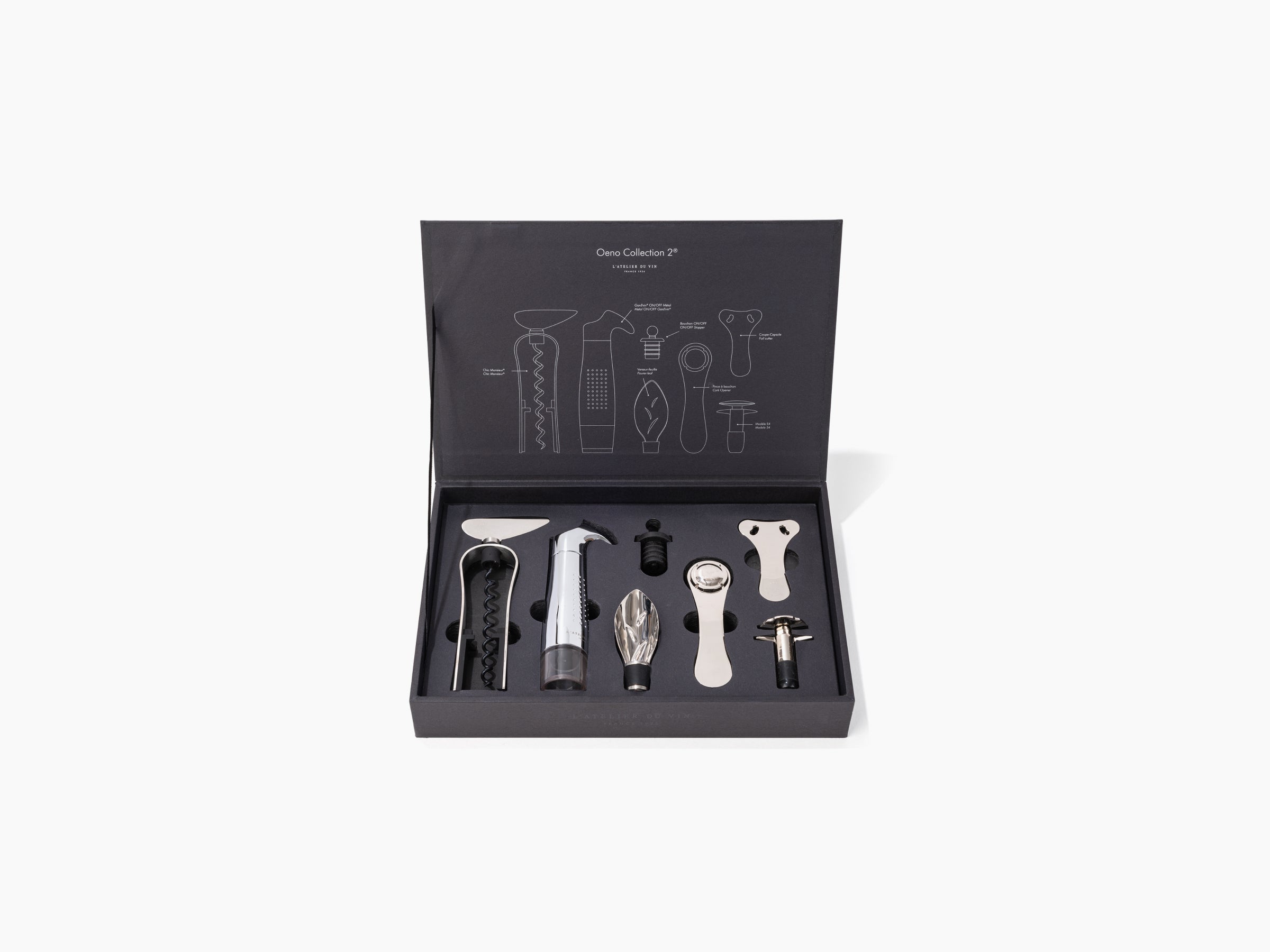 Inside a dark matte box, the Oeno Collection 2 wine tools are neatly arranged in foam slots.
