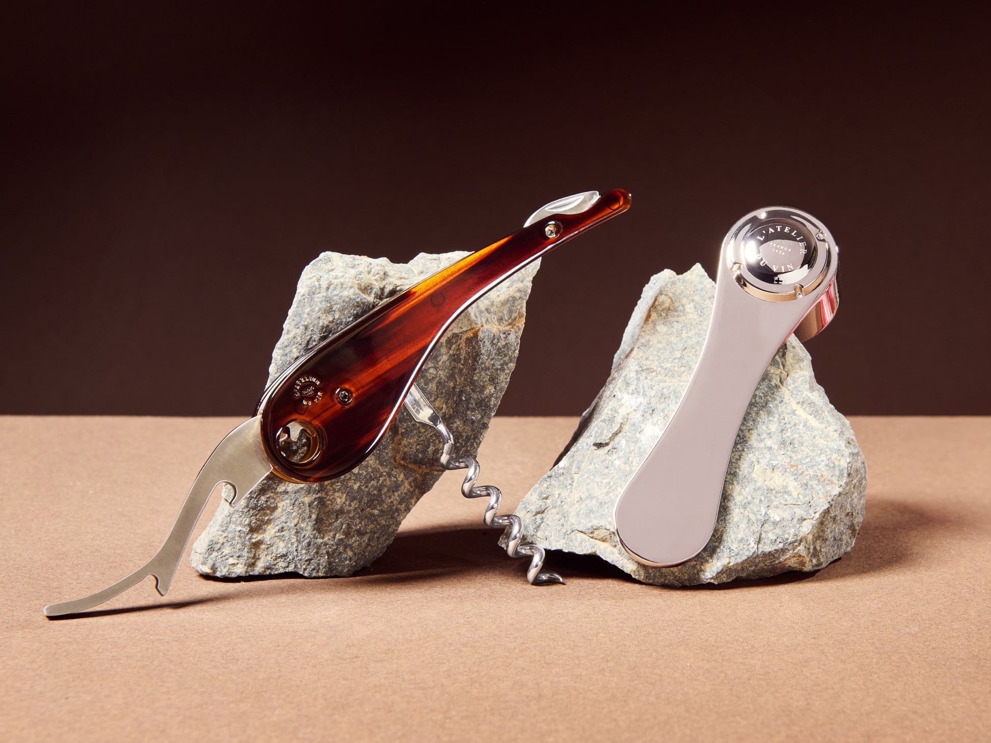 Oeno Collection 4 corkscrew and lever opener with tortoiseshell handle displayed on rocks