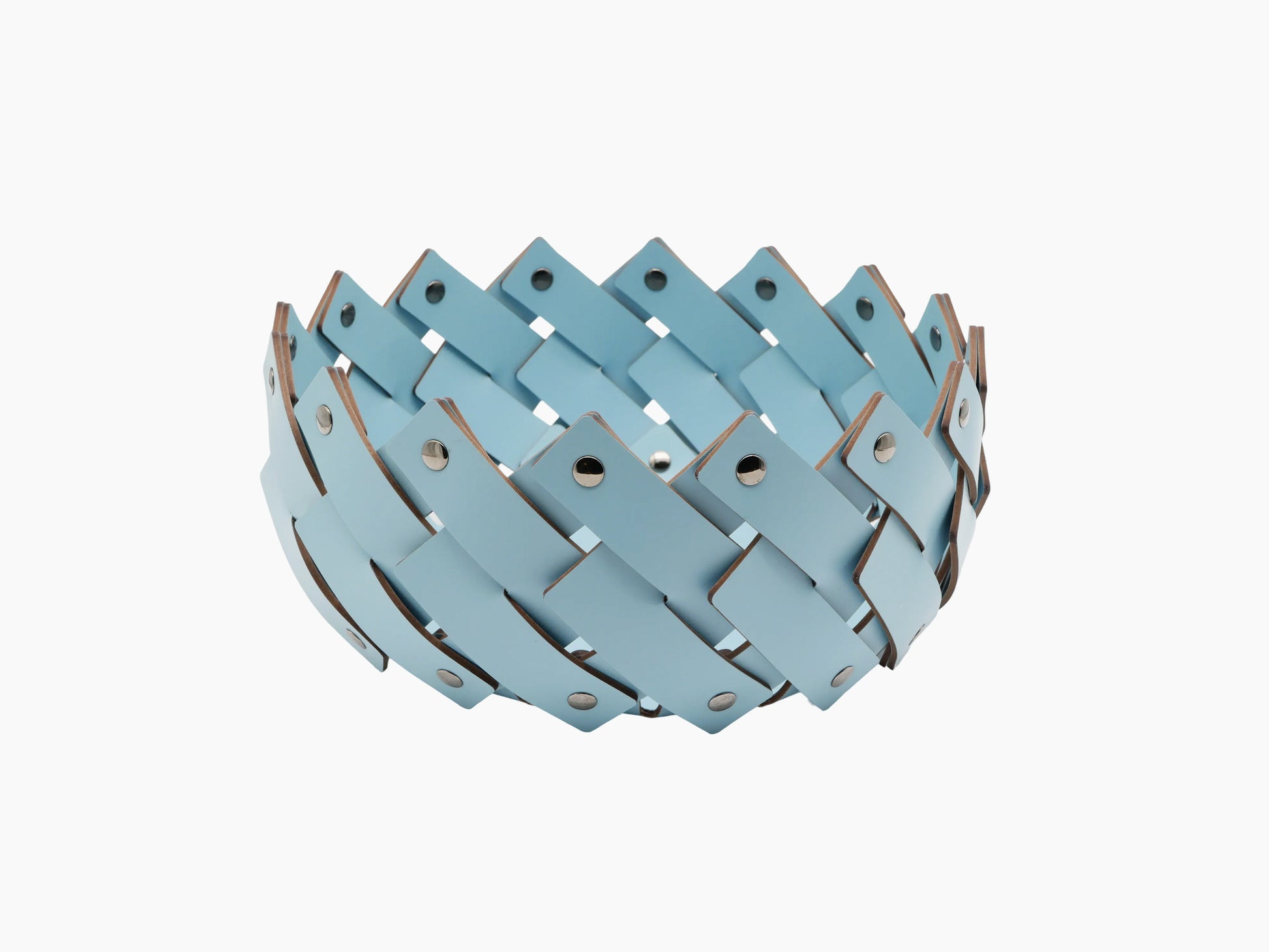 Round towel basket woven from blue leather strips with polished chrome fittings