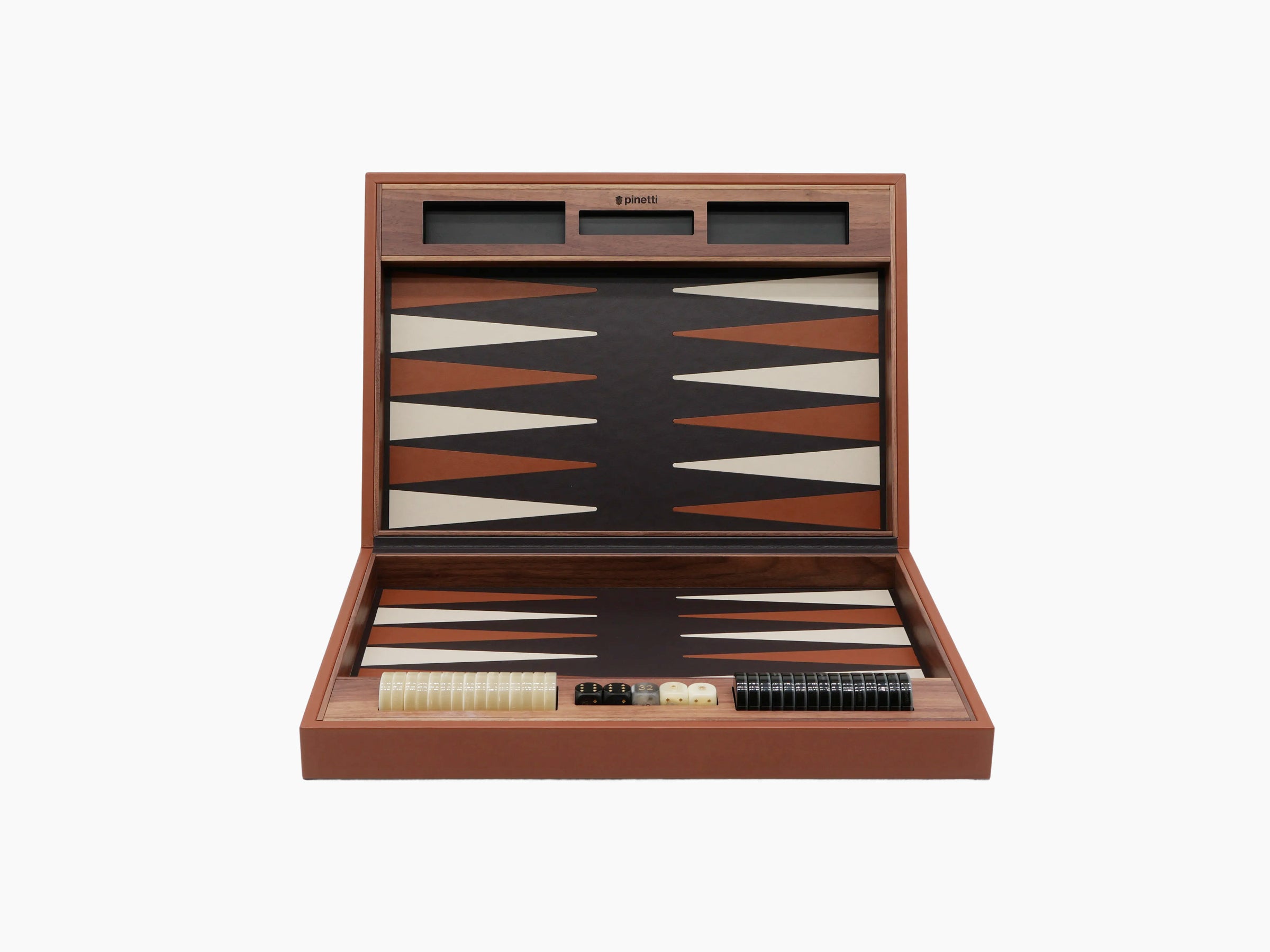 Open backgammon set in warm Canaletto walnut with leather playing surface and scattered pieces.