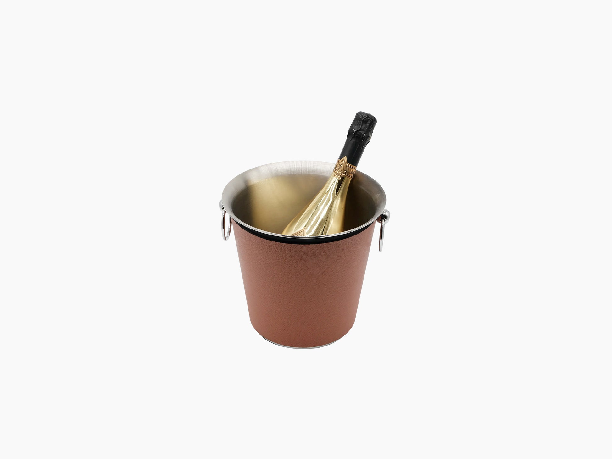 Champagne bucket with leather exterior and metal interior cradling a bottle at an angle