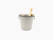 Textured metal champagne bucket with ring handles and a champagne bottle inside