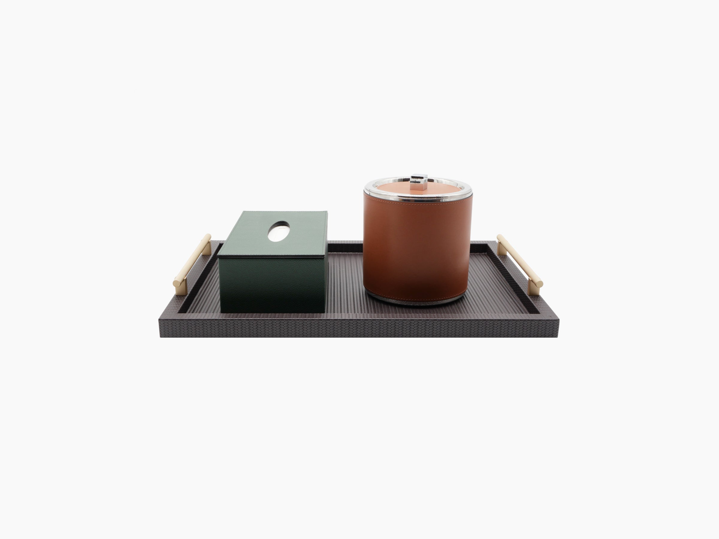 Large Dafne Tray displayed with a green storage box and a brown canister on its dark leather surface and light wood handles