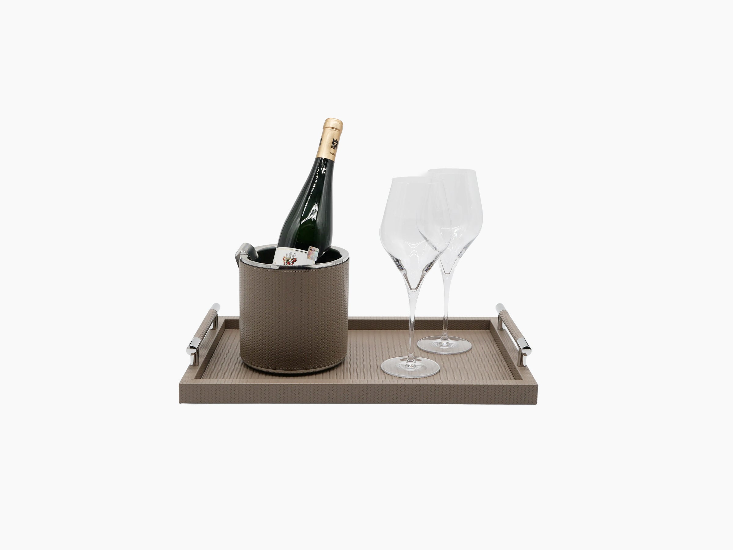 Dedalo Medium Tray featuring a brown wine bucket and three stemmed glasses on beige leather.