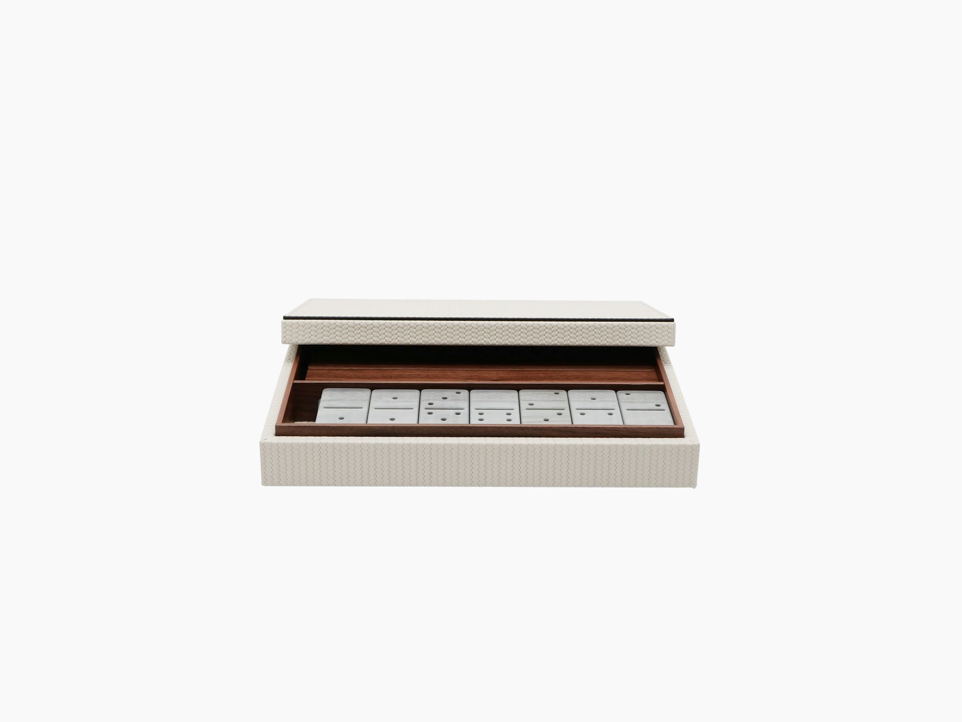 Textured light exterior dominoes box closed with visible domino tiles inside.