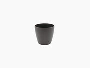 Dark gray textured flower pot with vertical ridges.