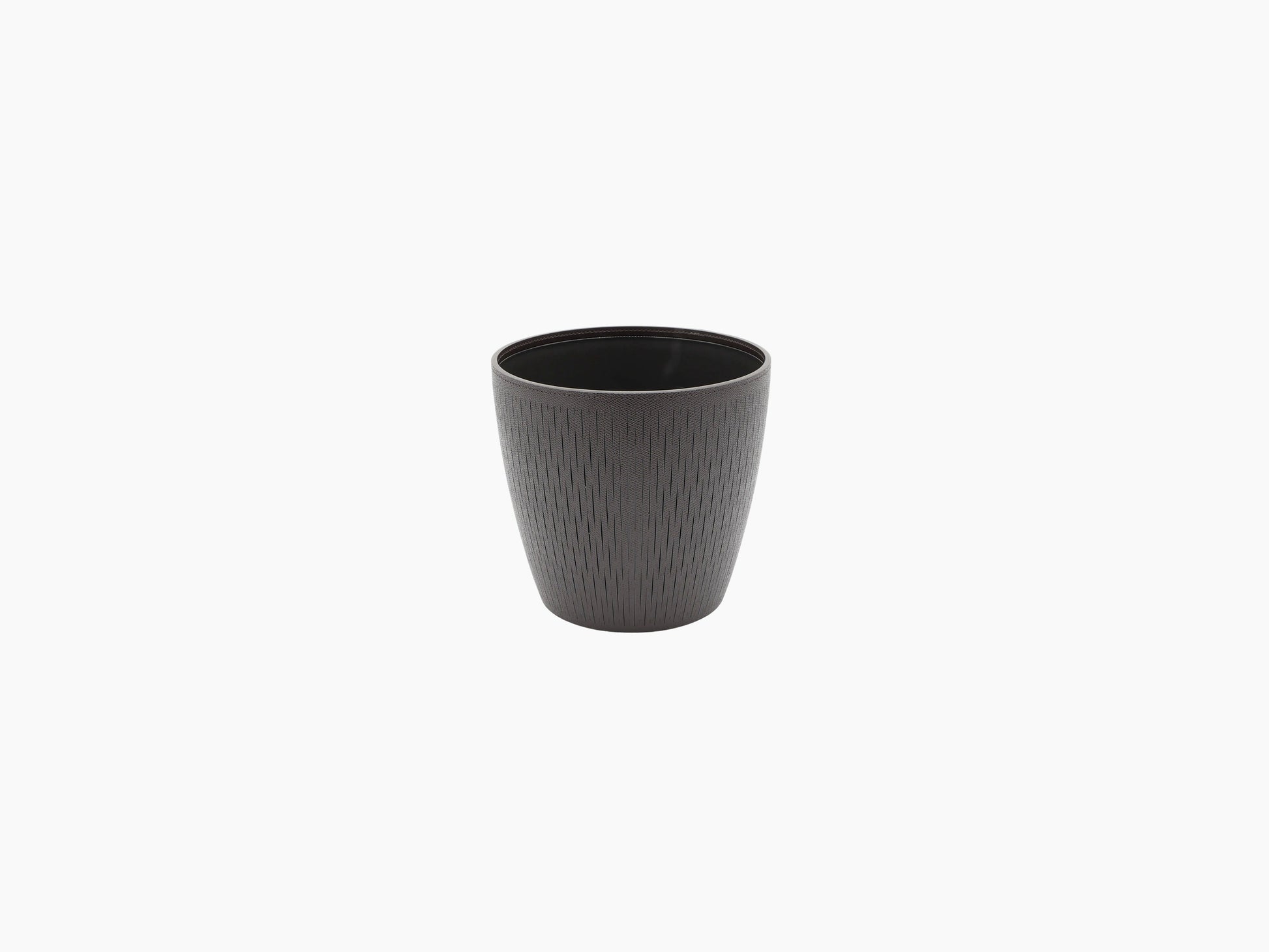 Dark gray textured flower pot with vertical ridges.