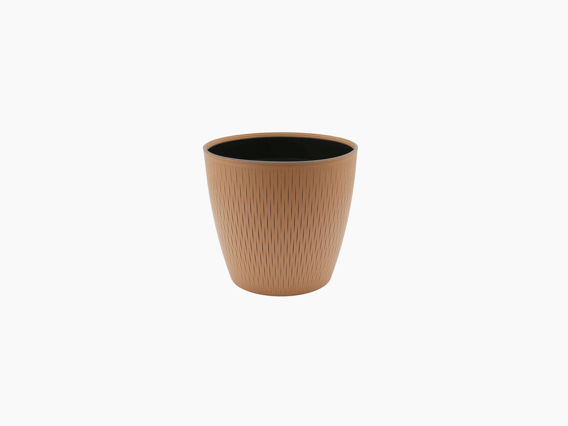 Medium Silvy flower pot in warm tan with textured surface and black interior