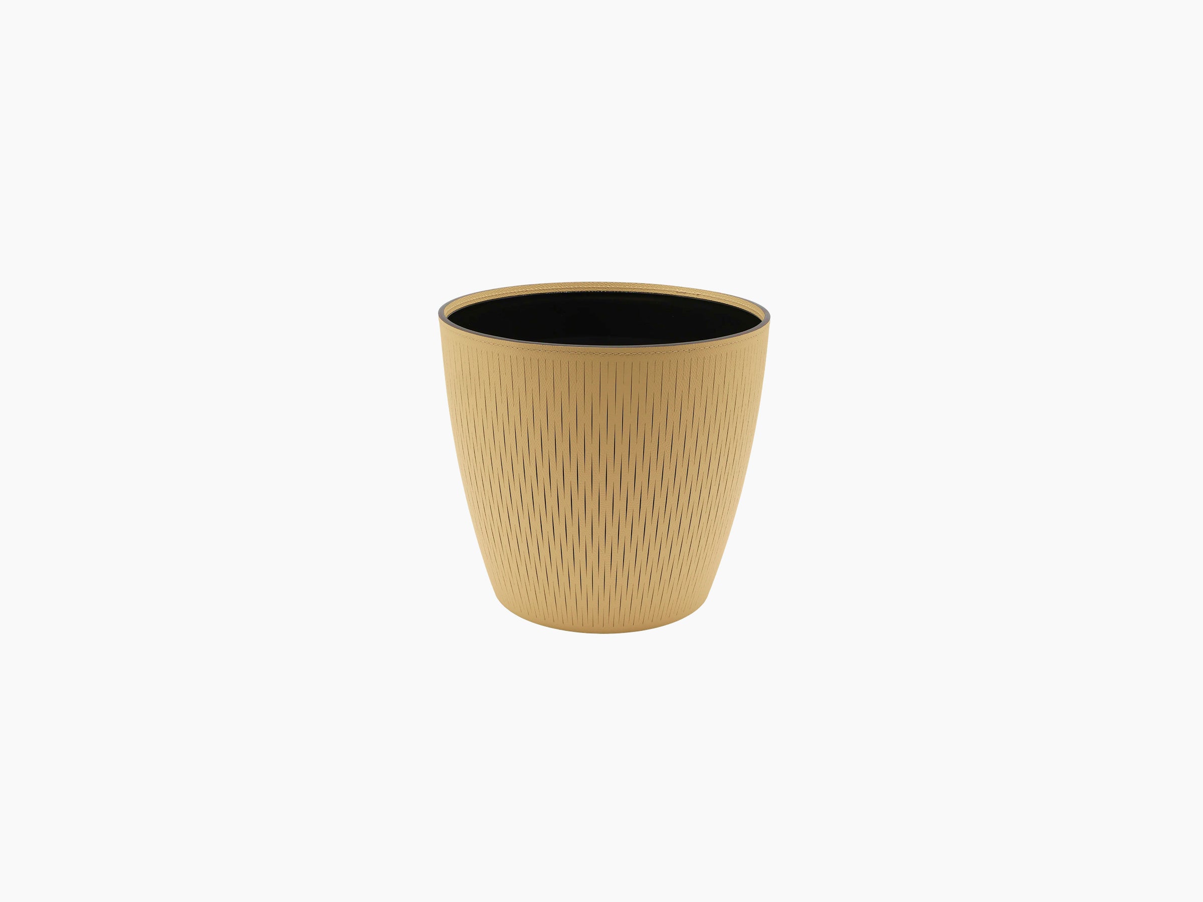 Medium Silvy Flower Pot in tan with a black interior and vertical pattern.