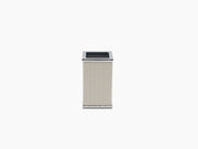 Square toothbrush holder with chrome accents and beige waterproof leather wrap