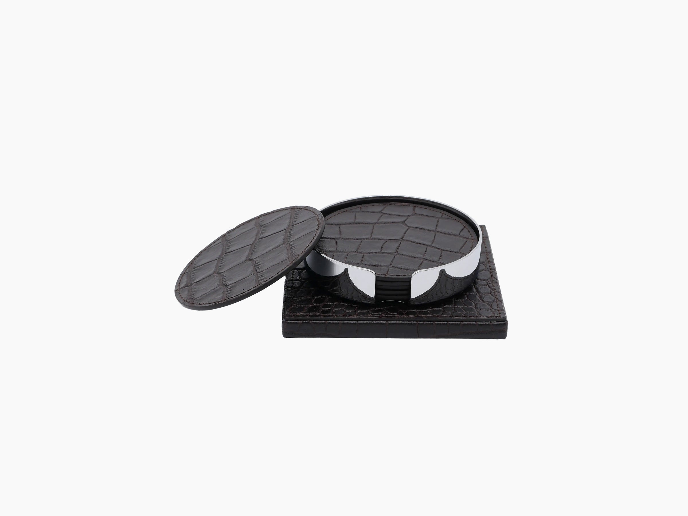 Open leather wrapped coaster holder with six leather coasters on a dark wooden base