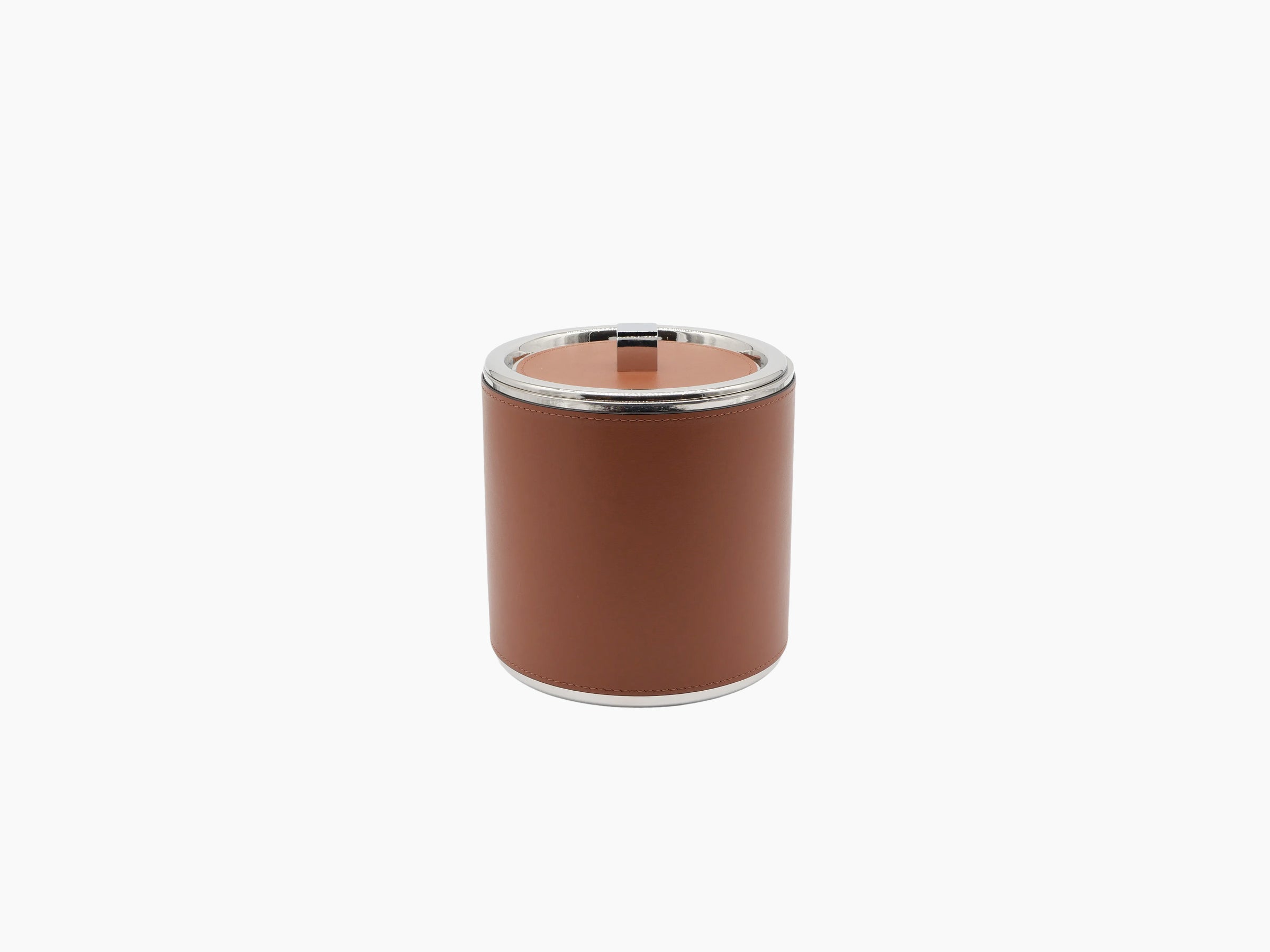 Brown leather wrapped ice bucket with chrome rim and a lid resting beside it.