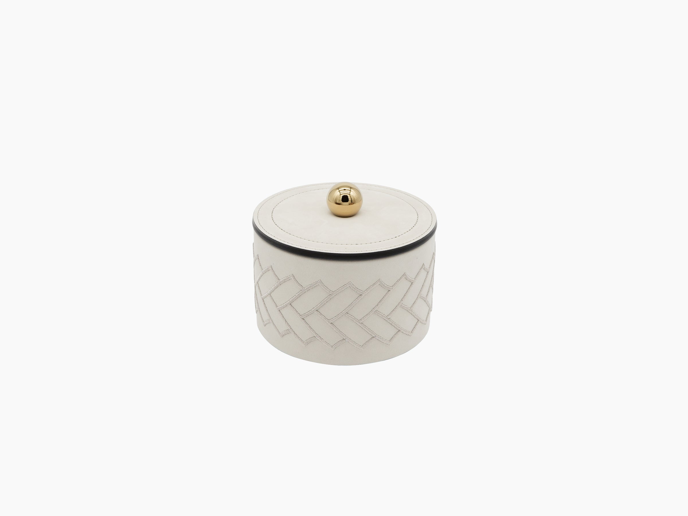 Cream round box with a gold lid knob and a stitched herringbone pattern around the sides.