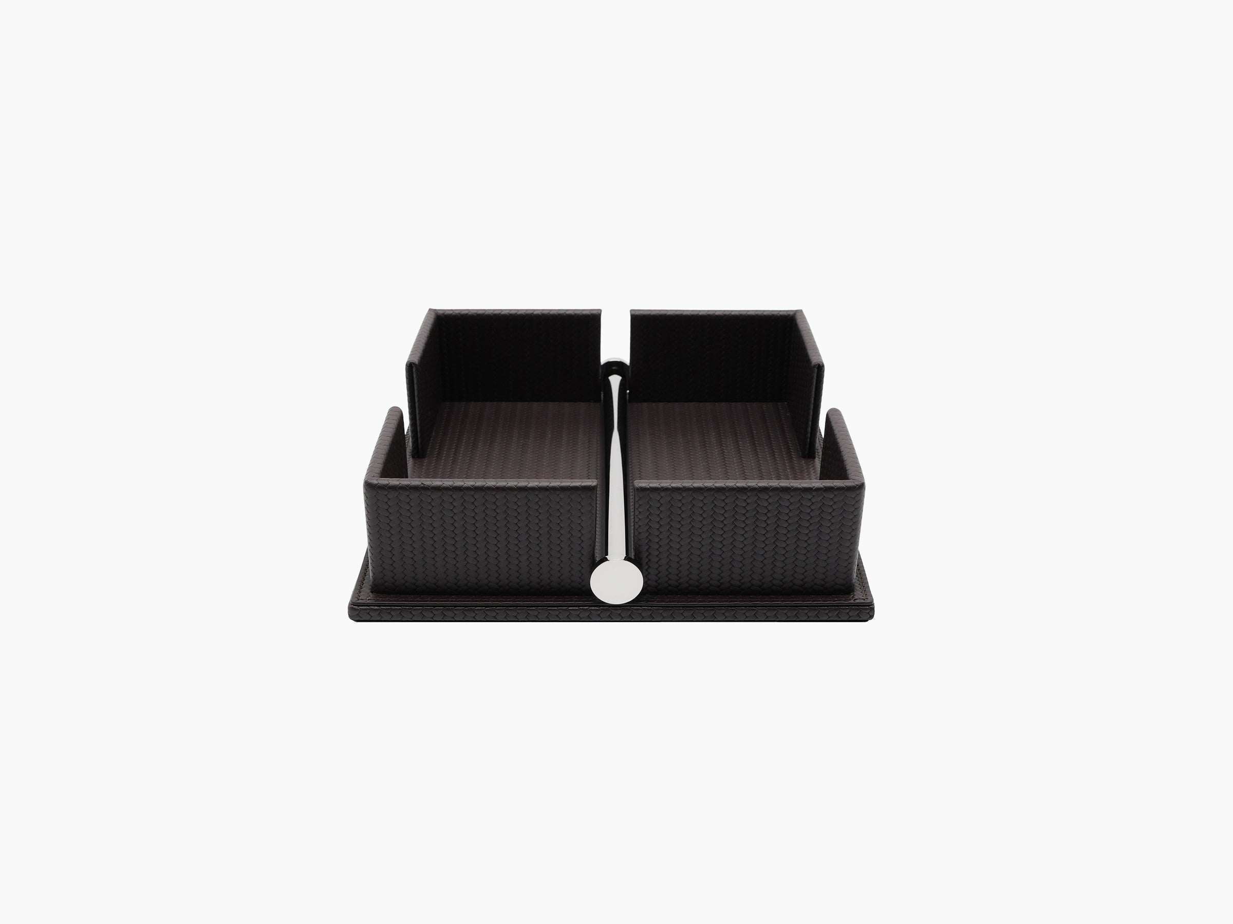 Dark leather two section napkin holder with a weighted chrome bar and white circular weight at the front