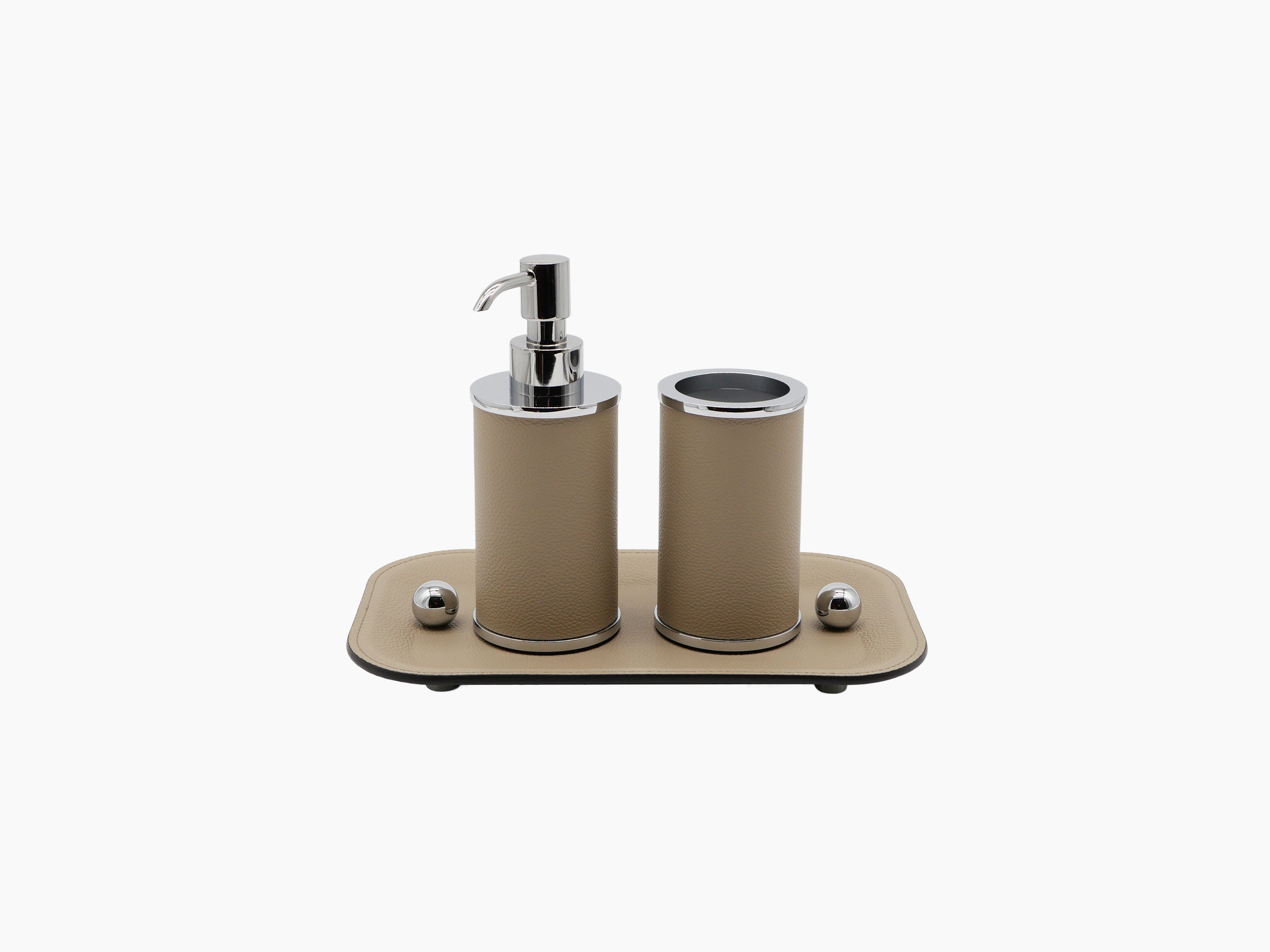 Beige Olimpia small leather tray with chrome feet for organizing bathroom accessories.