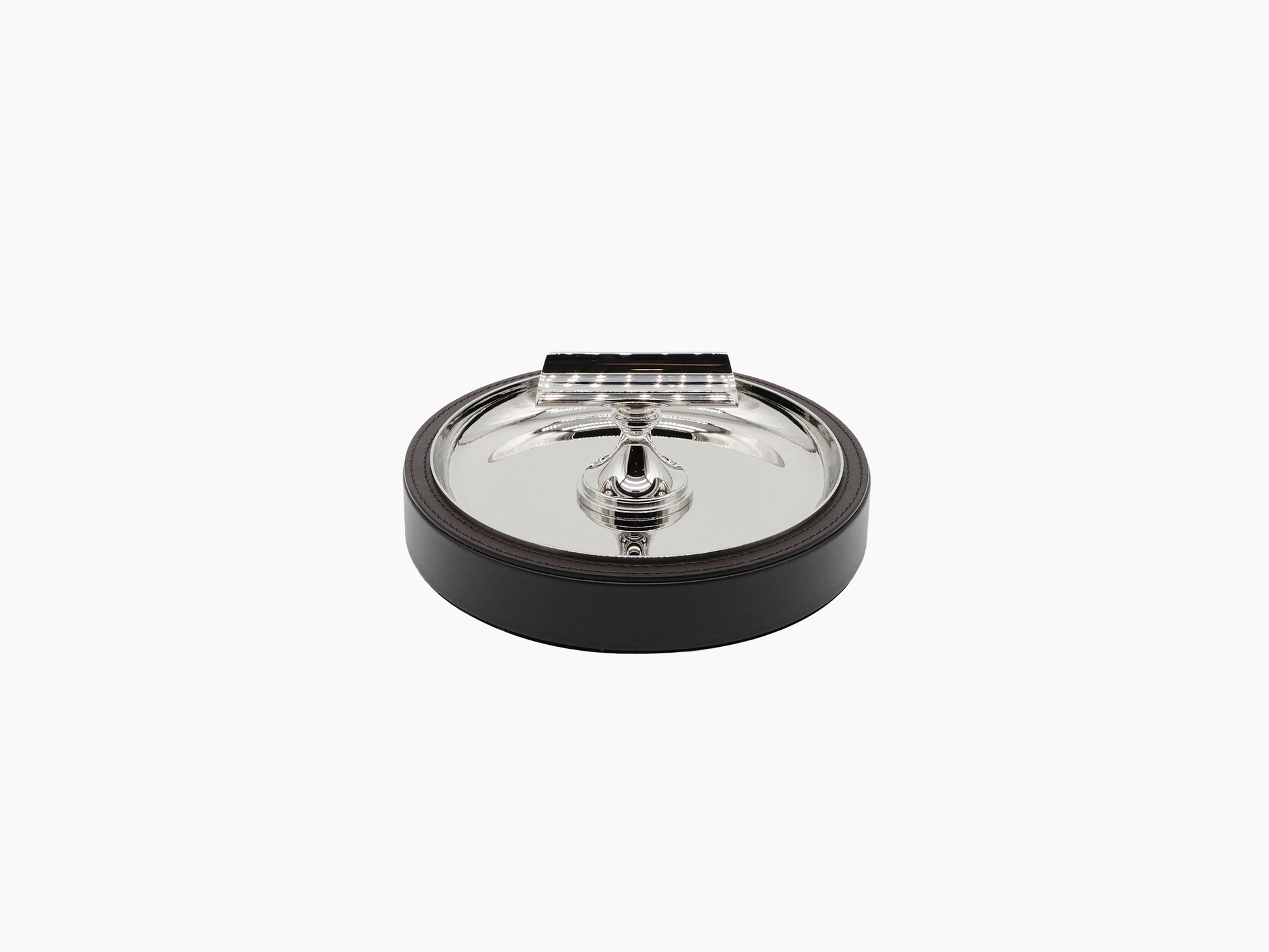 Sigaro Ashtray with a polished steel bowl and demi lune holder atop a dark wood base with leather edge