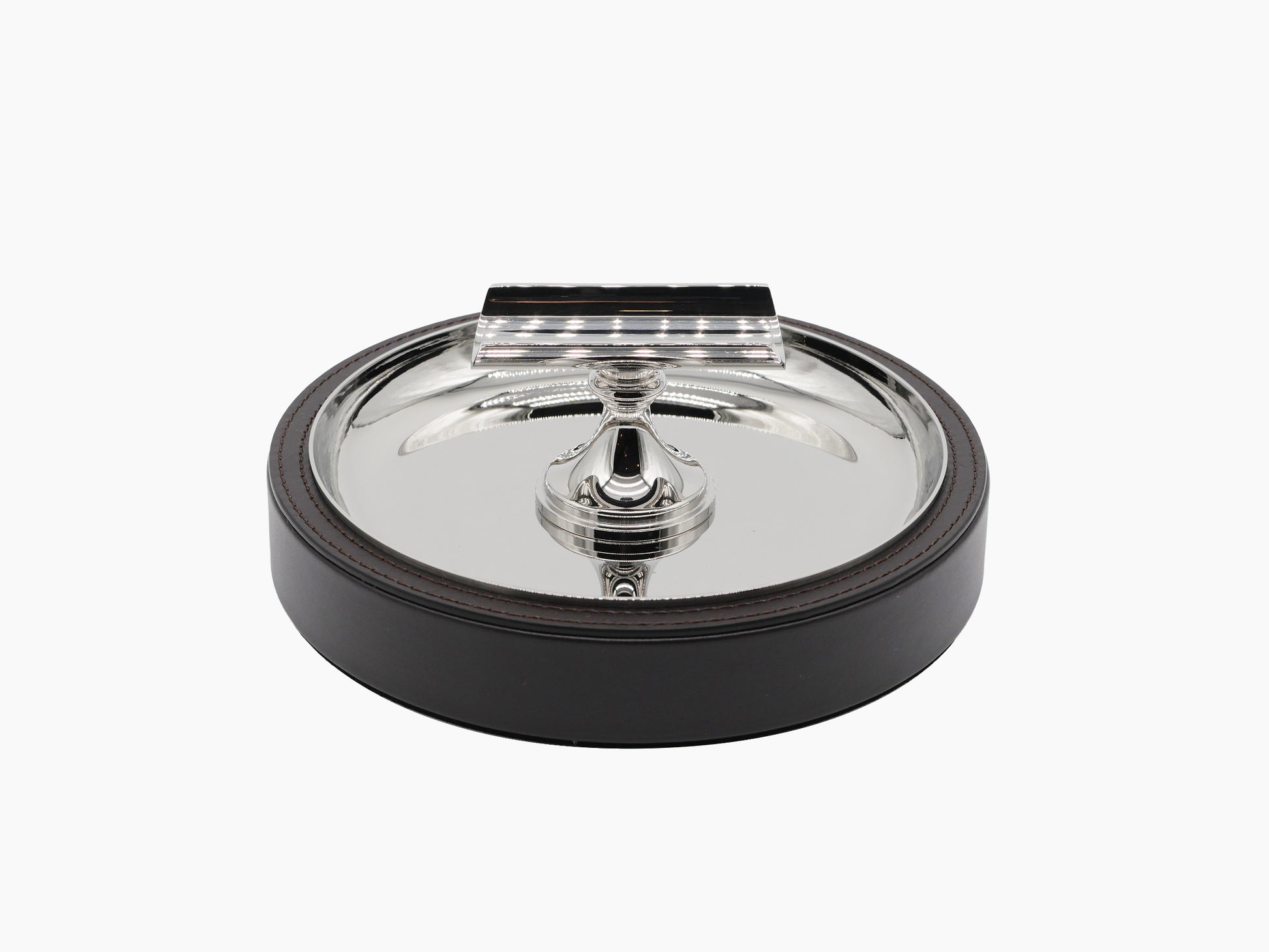 Sigaro Ashtray with a polished steel bowl a demi lune holder and leather trim on a dark wood base