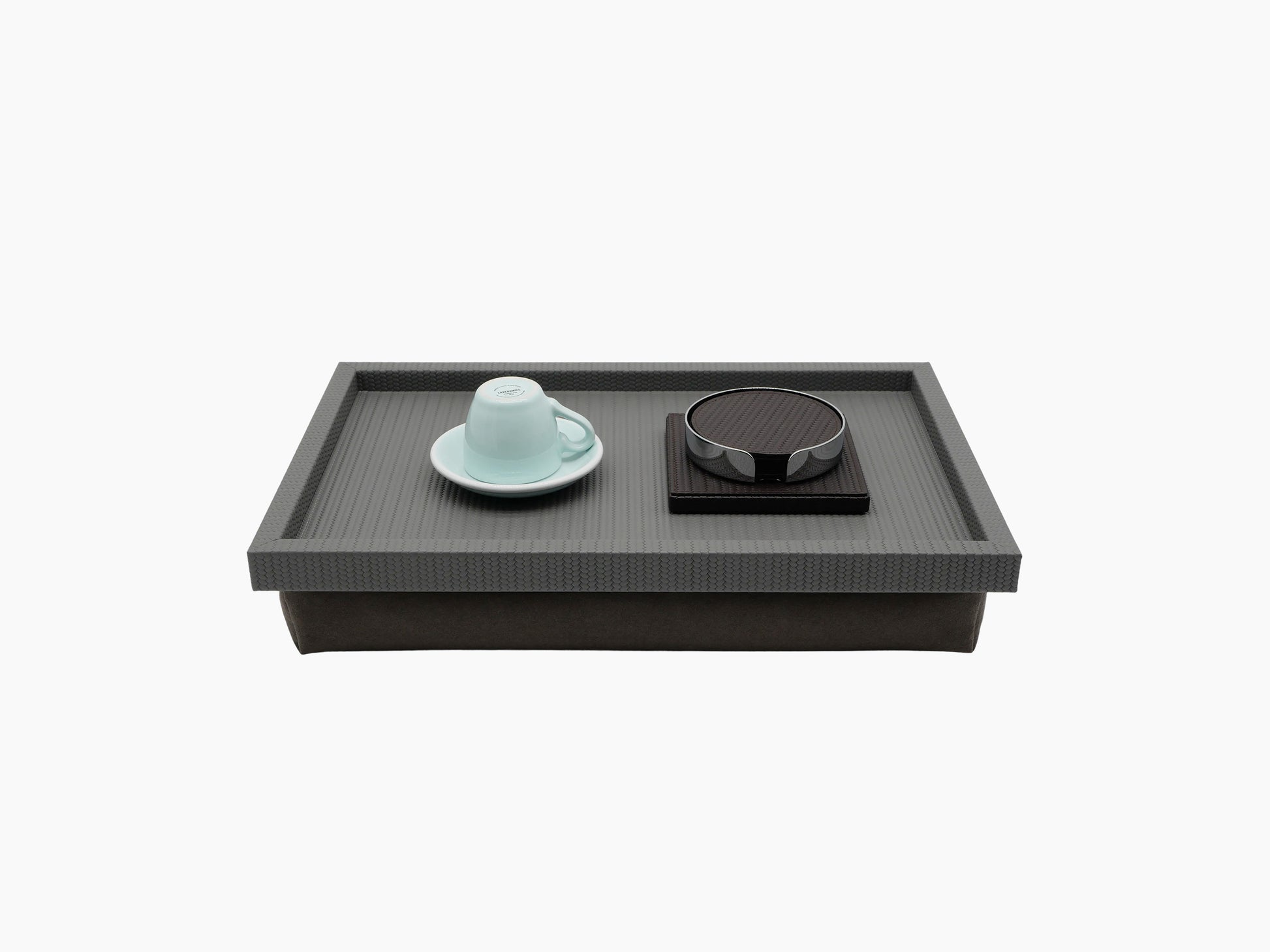 Teseo Bed Tray shown on a neutral backdrop with a blue teacup and saucer and a round dark accessory.