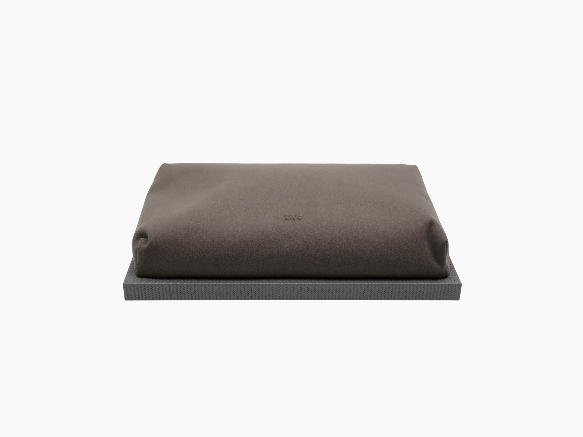 Teseo Bed Tray with a brown cushion resting on a gray woven tray.