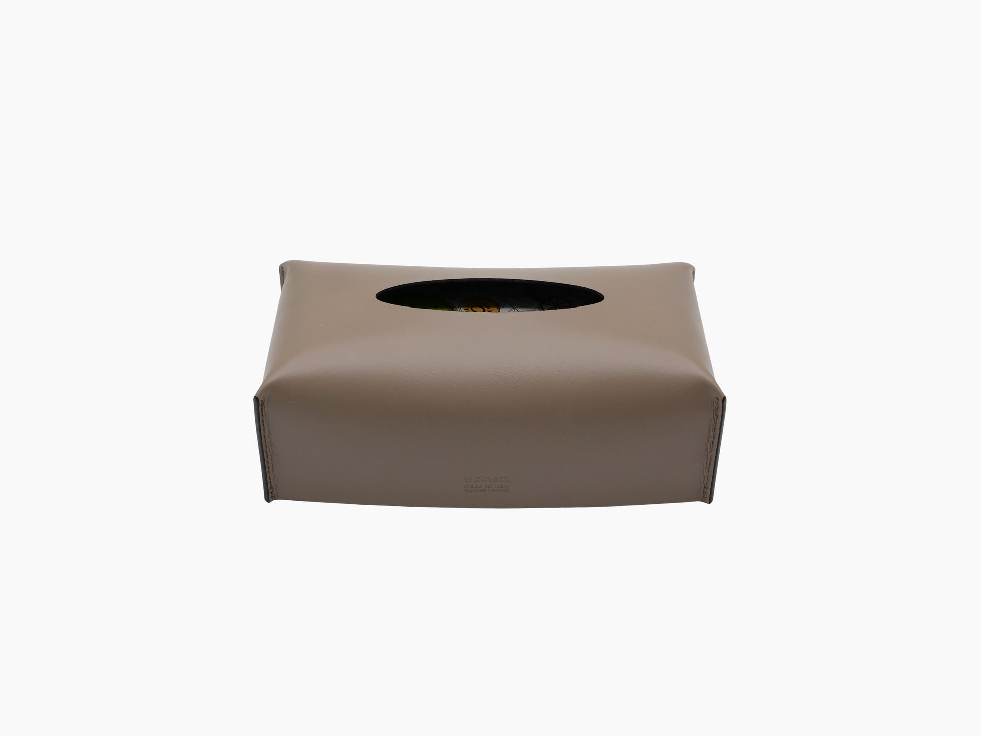 Taupe leather wrapped rectangular tissue box with an oval top opening