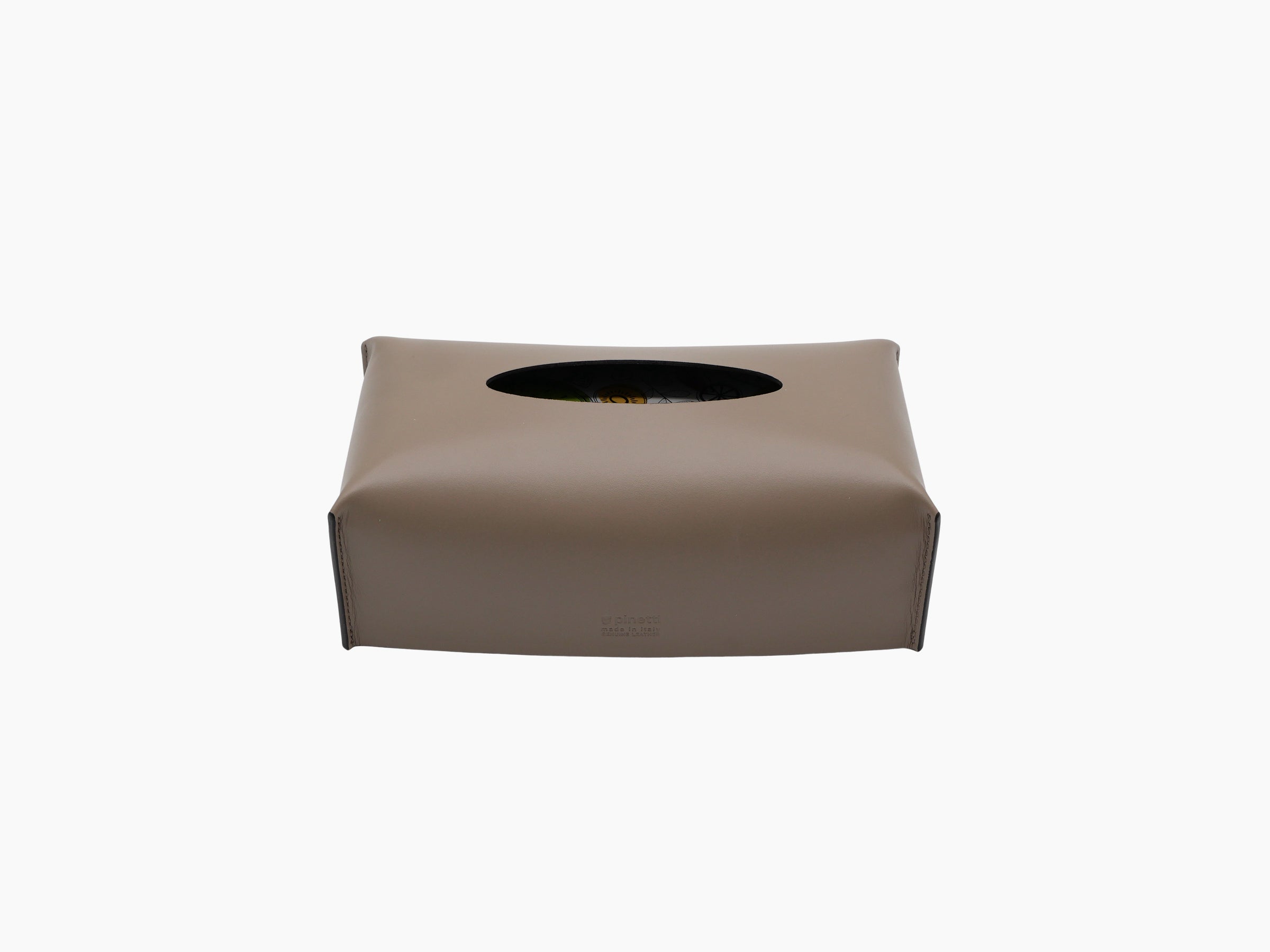 Taupe leather wrapped rectangular tissue box with an oval top opening