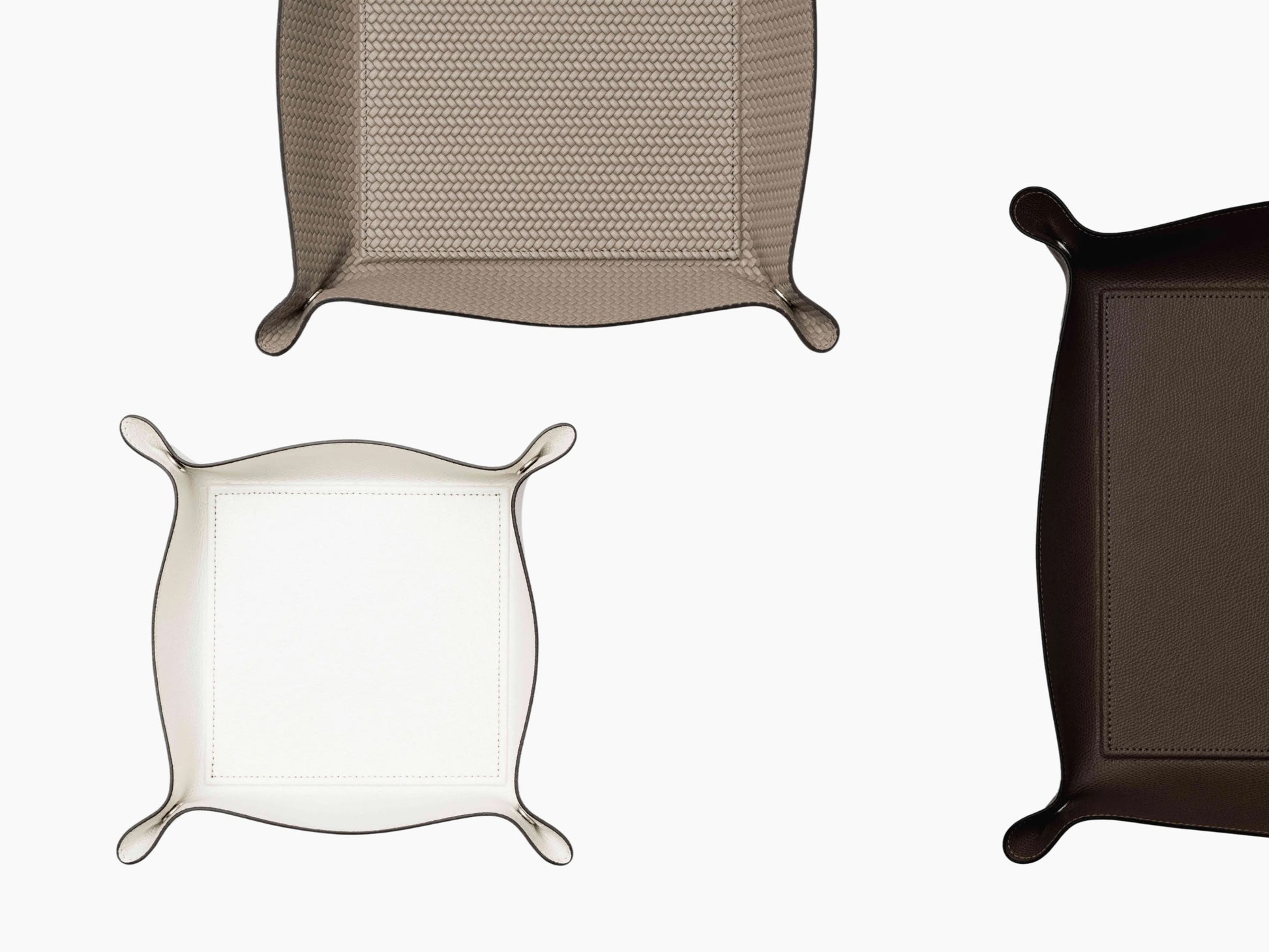 Assorted Square Trinket Large Tray color options beige textured, tan, white and dark brown shown together in a collage.