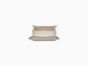 Top-down view of Square Trinket Small Tray in light beige leather with rounded corners and subtle edge stitching.