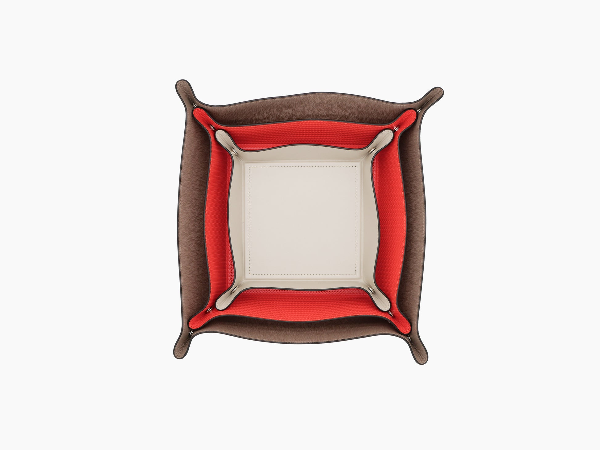 Angled view of brown leather Square Trinket Small Tray showing red lining and beige interior