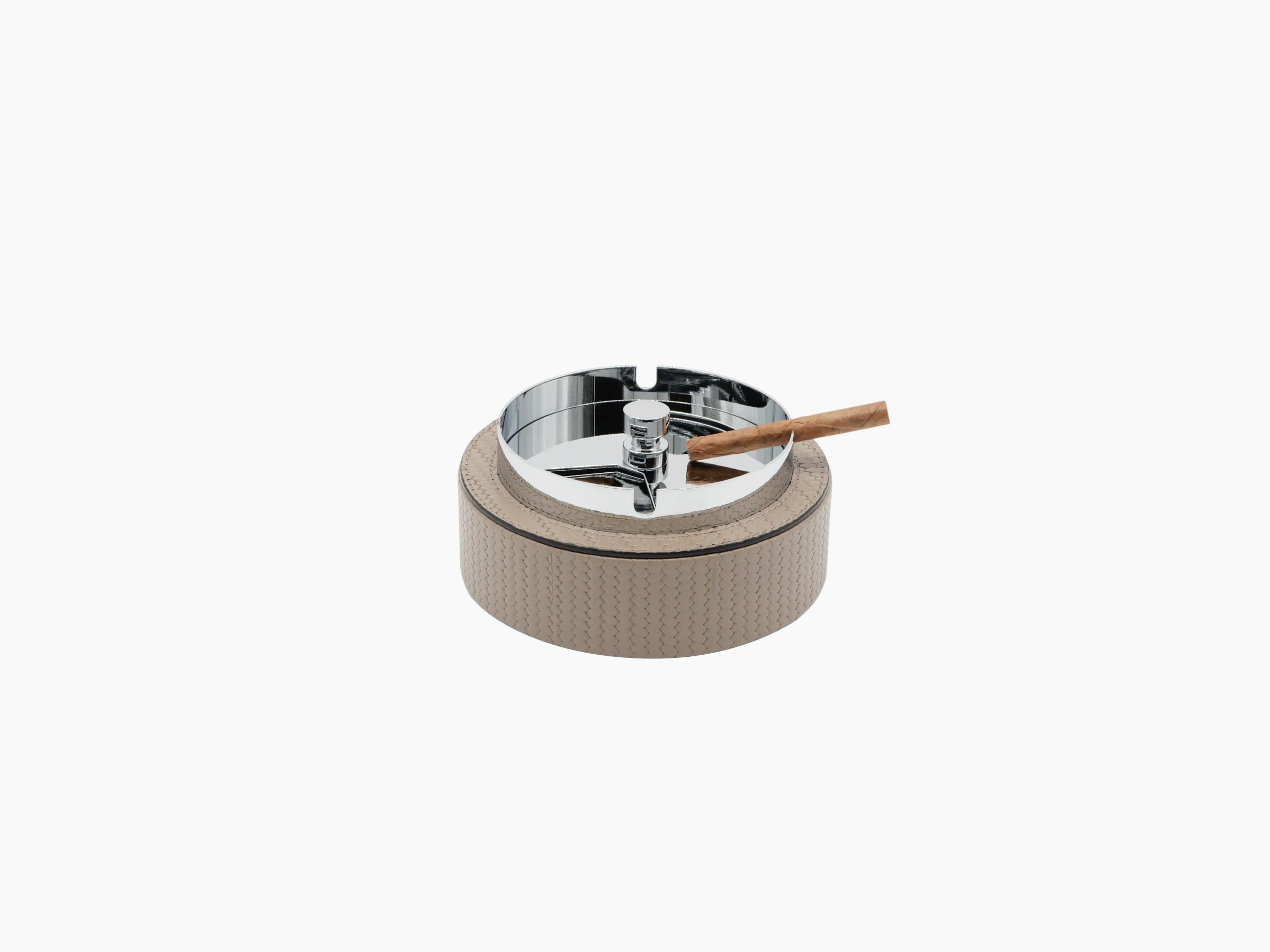 Vento ashtray in beige leather with chrome interior holding a cigar