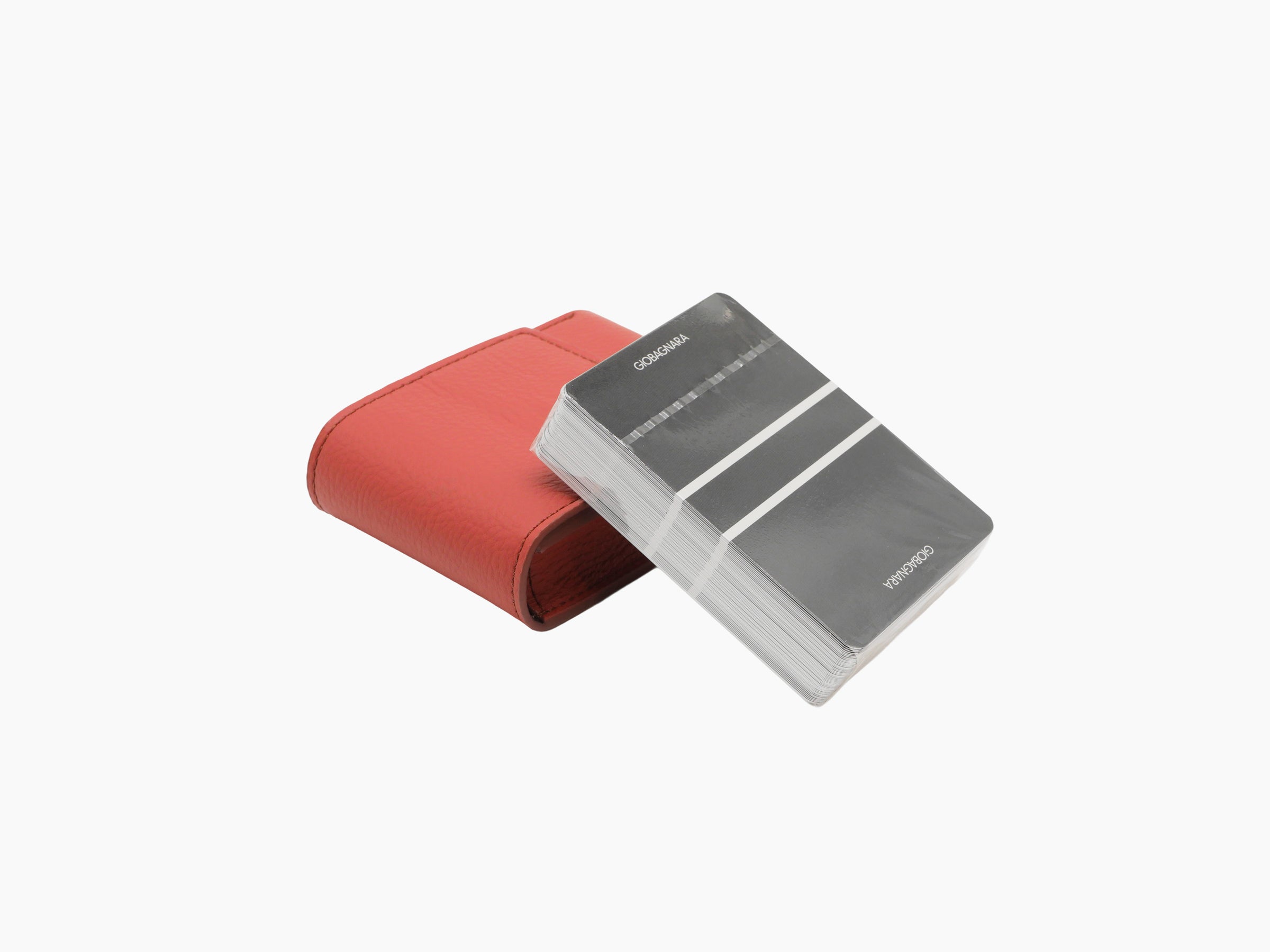 Red Pelle Frau leather playing cards pochette with a Giobagnara deck in gray wrap.