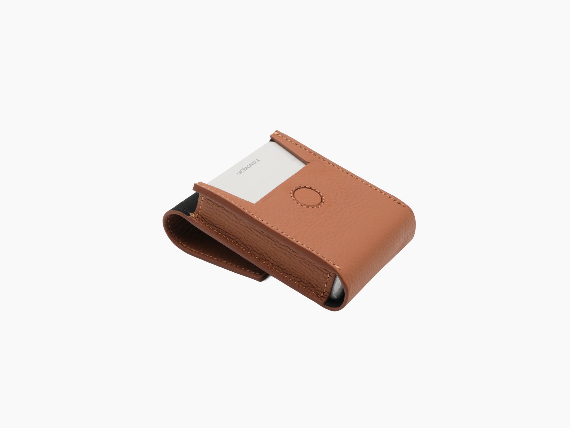 Tan Pelle Frau leather card holder with a partially visible deck of Giobagnara playing cards