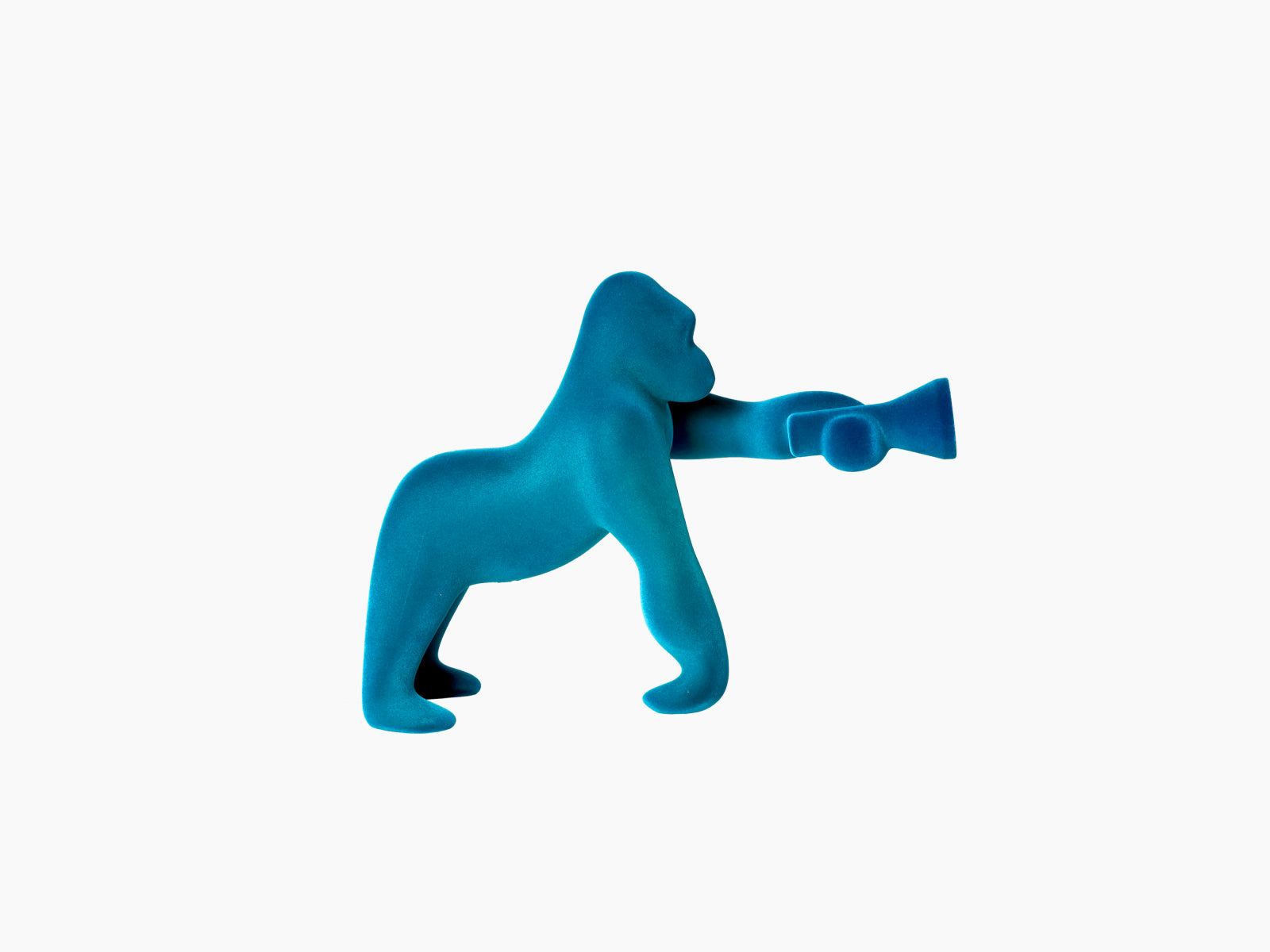 Kong XS lamp velvet light blue in gorilla form with an adjustable arm extending to the right.