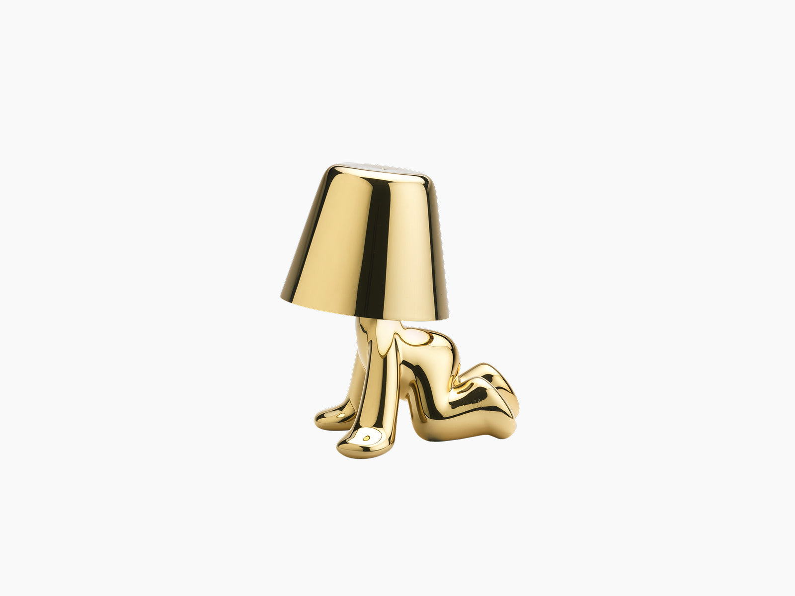 Golden Brothers Ron lamp sculpture in polished gold with a cone shade resting on a reclining figure
