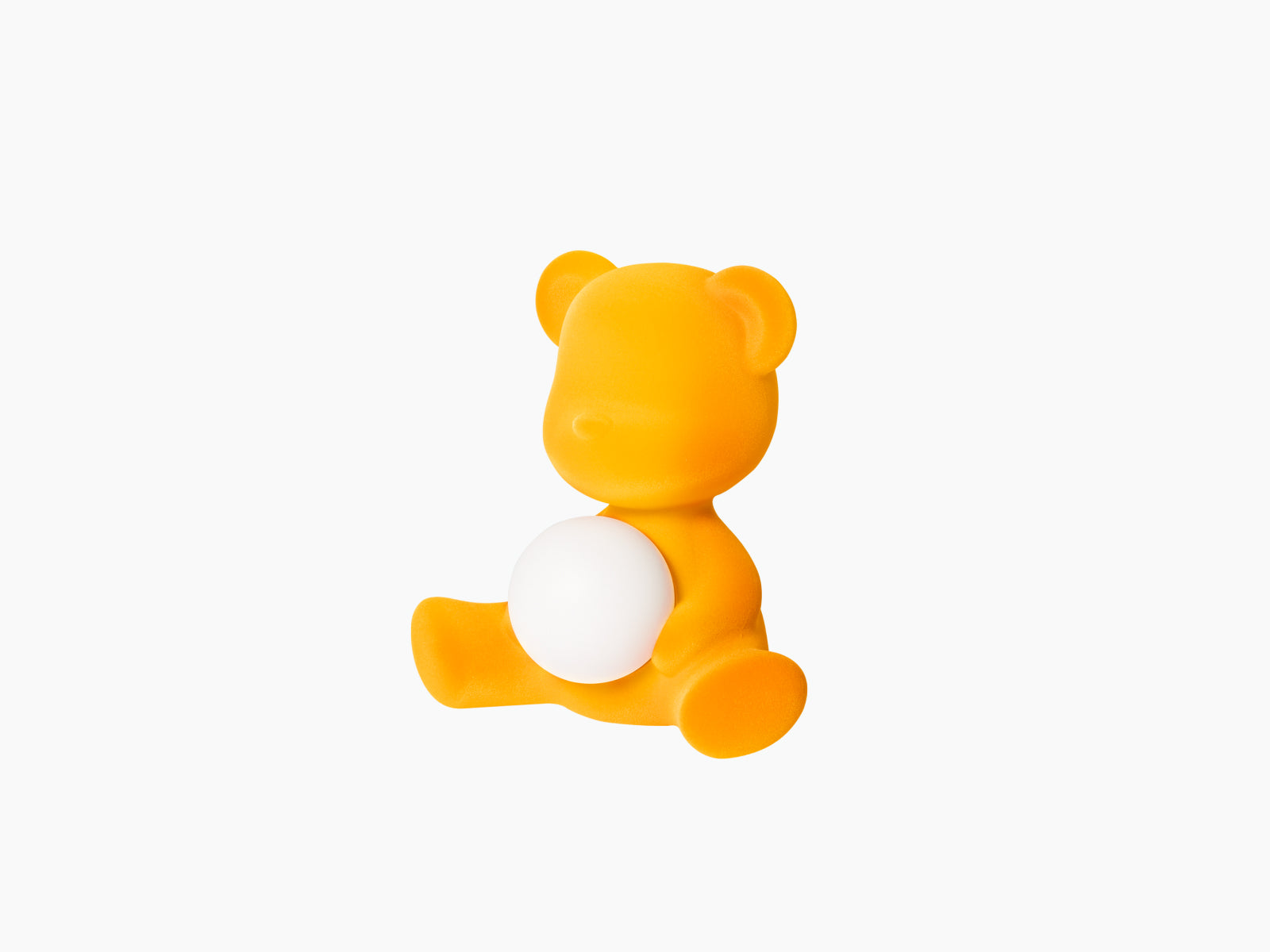 Velvet Dark Gold Teddy Girl LED lamp in a seated pose holding a glowing white sphere.