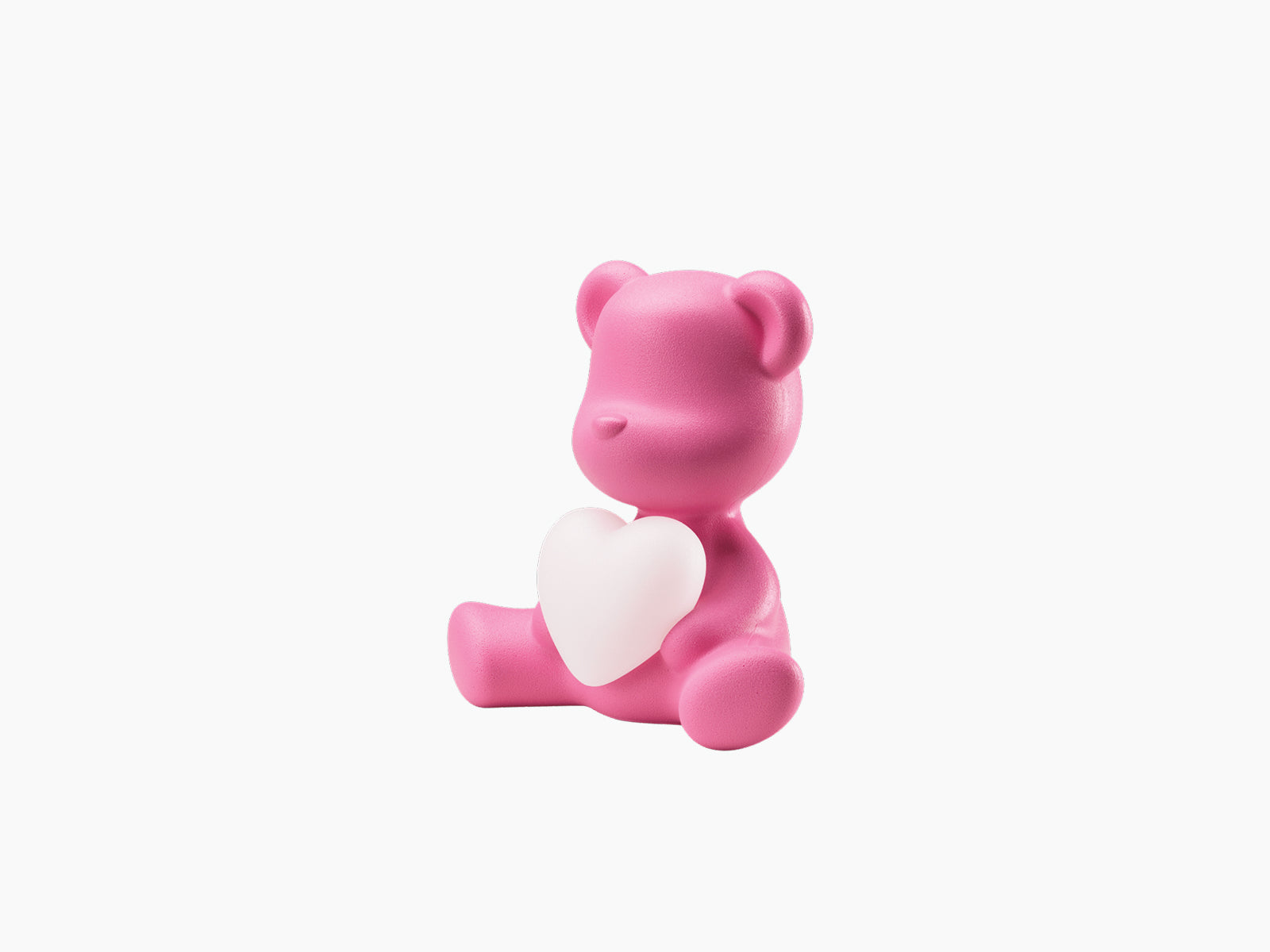 Bright pink Teddy Love LED Lamp XS bear sitting and holding a white heart