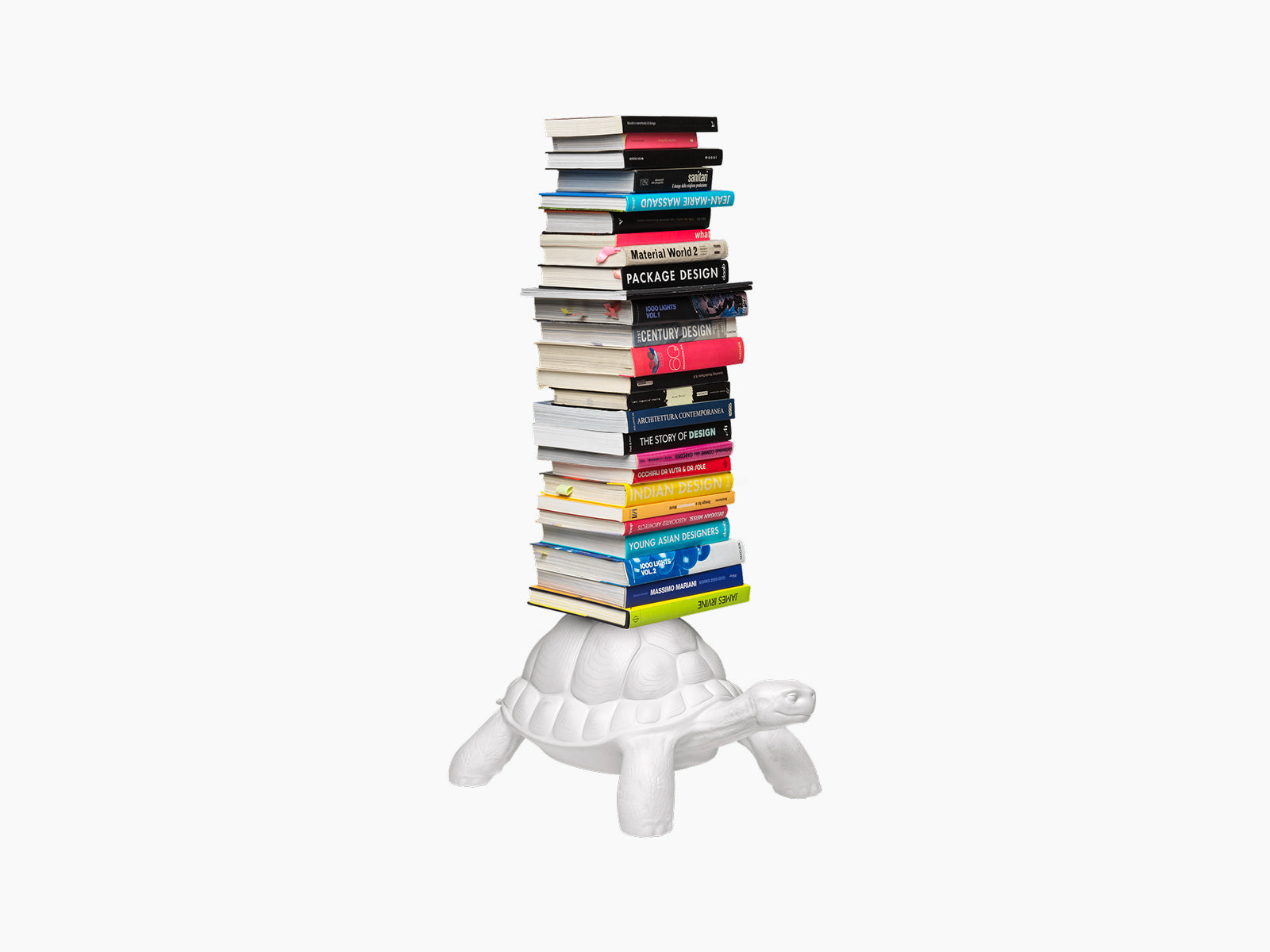White Turtle Carry Bookcase bearing a tall stack of colorful books on its back