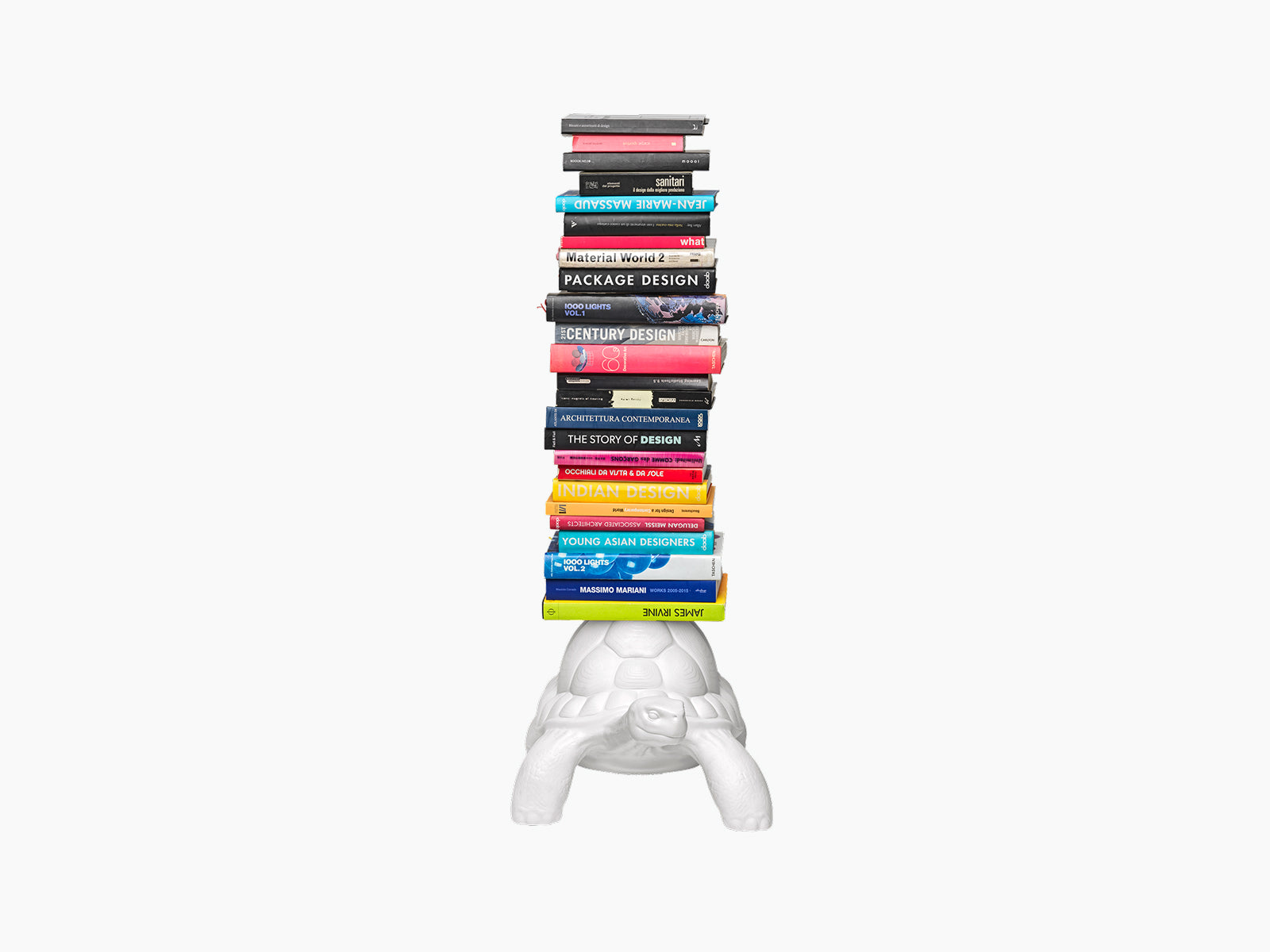 White Turtle Carry Bookcase with a stacked column of books on its back