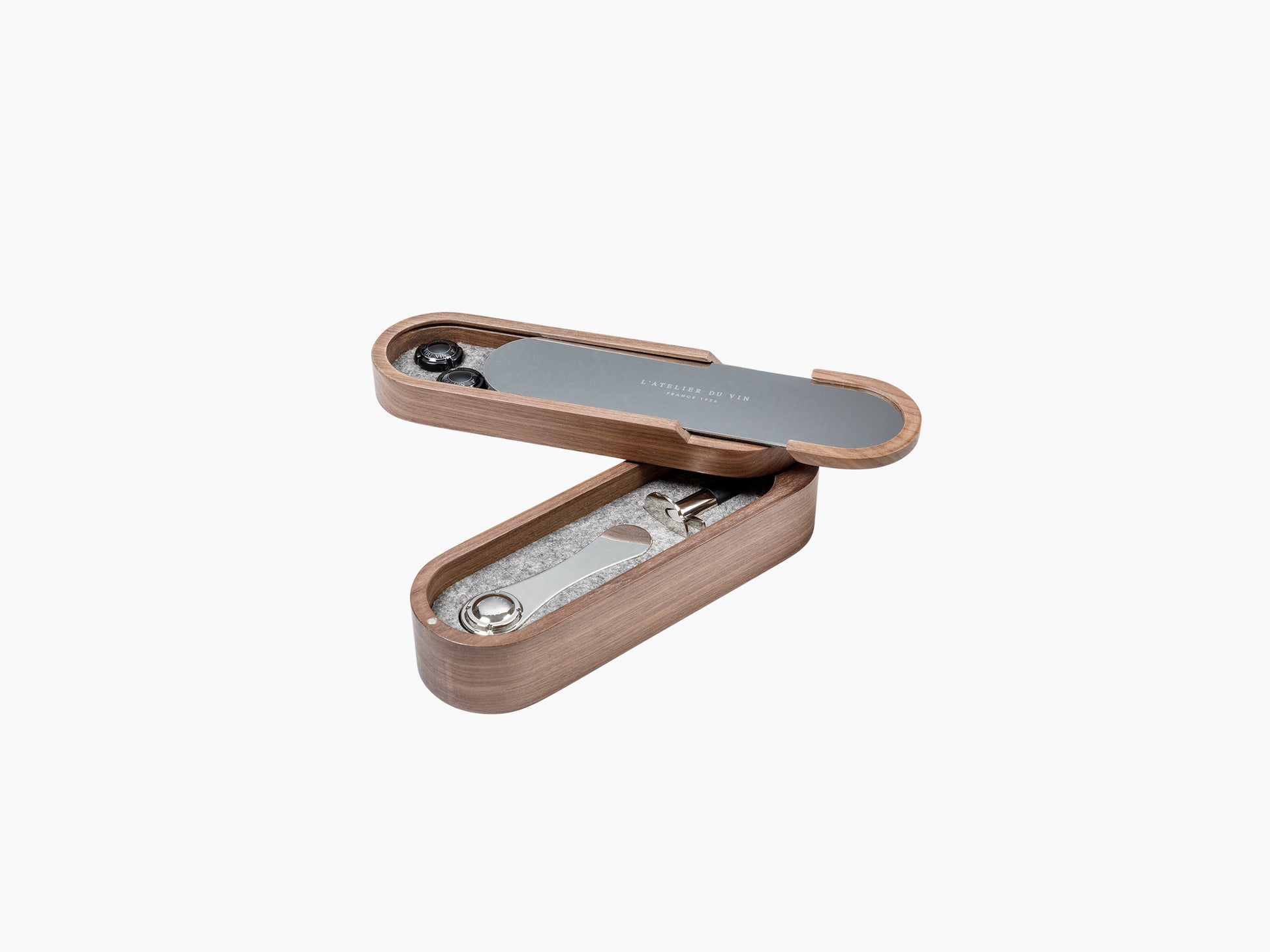 Open walnut Sparkling Set case showing champagne accessories arranged inside