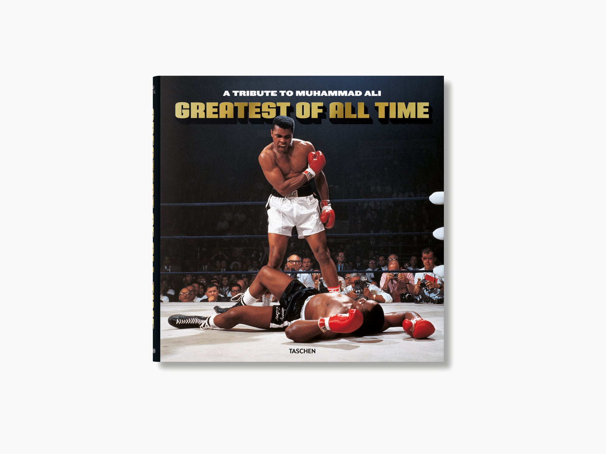 Book cover titled Greatest of All Time A Tribute to Muhammad Ali showing Muhammad Ali standing over a fallen opponent in a boxing ring