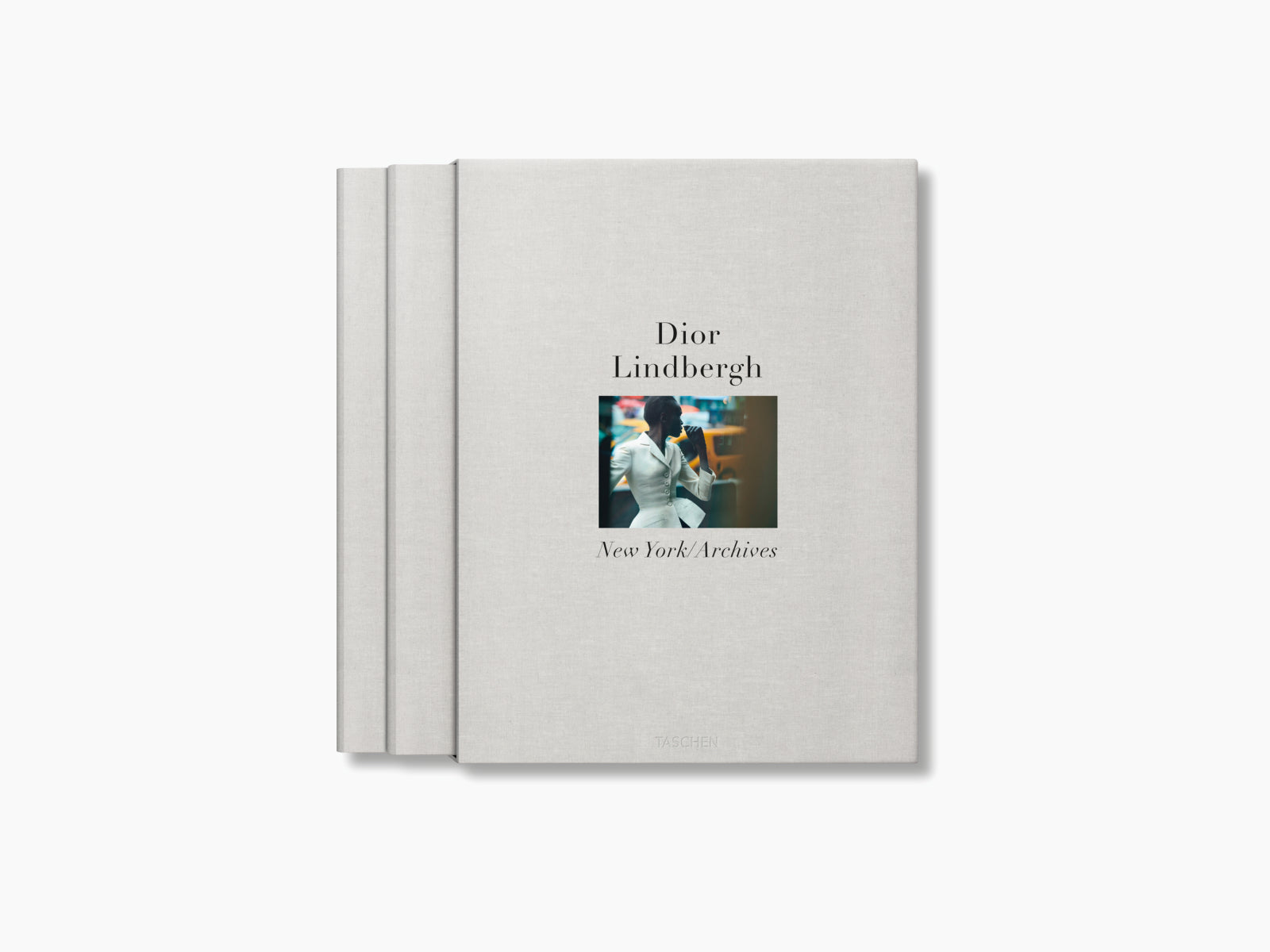 Two-volume Dior Lindbergh New York Archives book set with a small centered photo on a linen cover