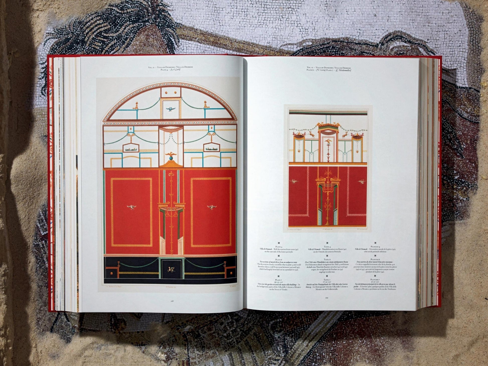 Open spread from Fausto & Felice Niccolini Pompeii volume featuring bold orange interior panels and decorative border motifs.