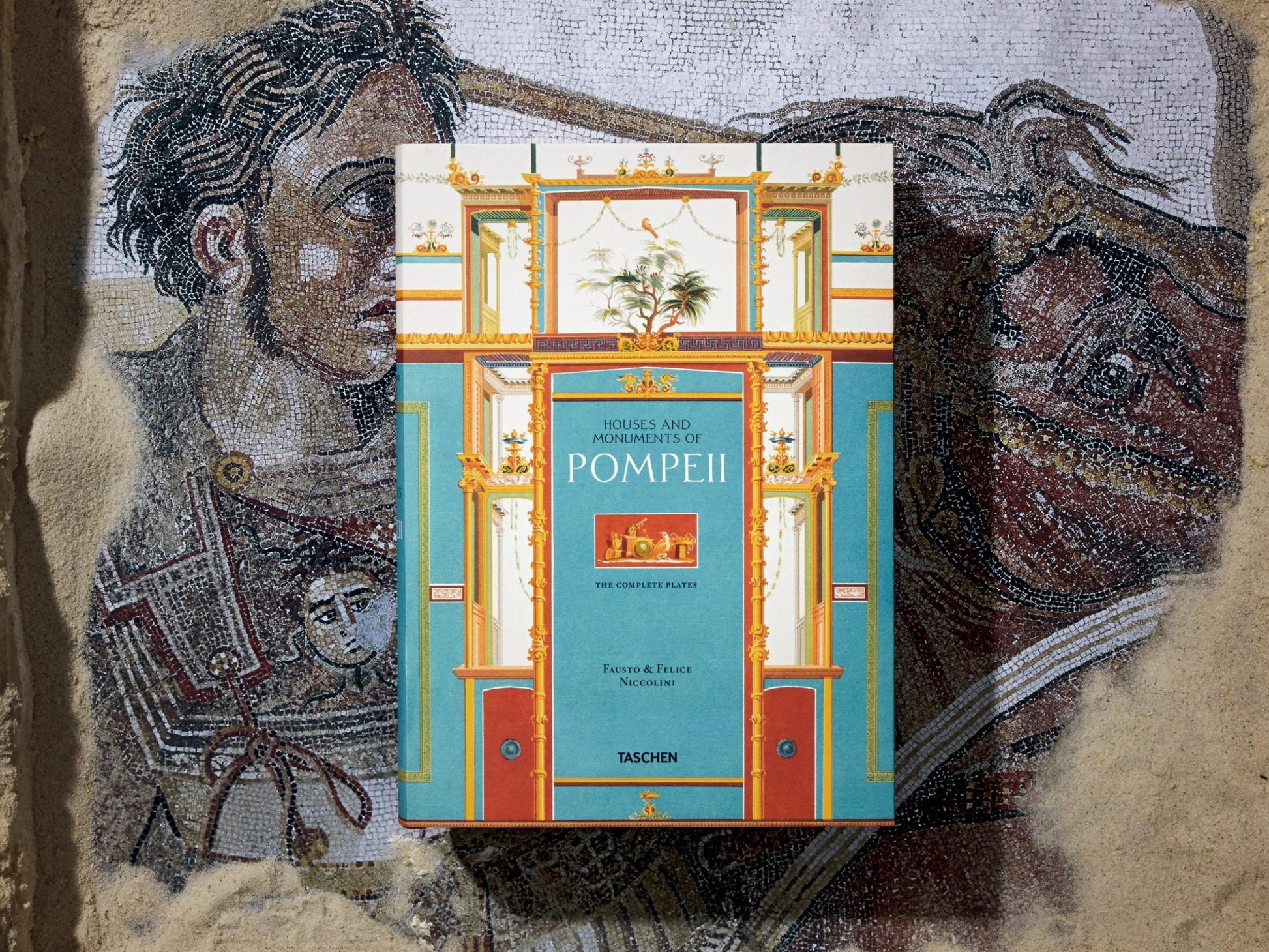 Colorful book cover for Pompeii volumes with turquoise central panel and ornate architectural framing.