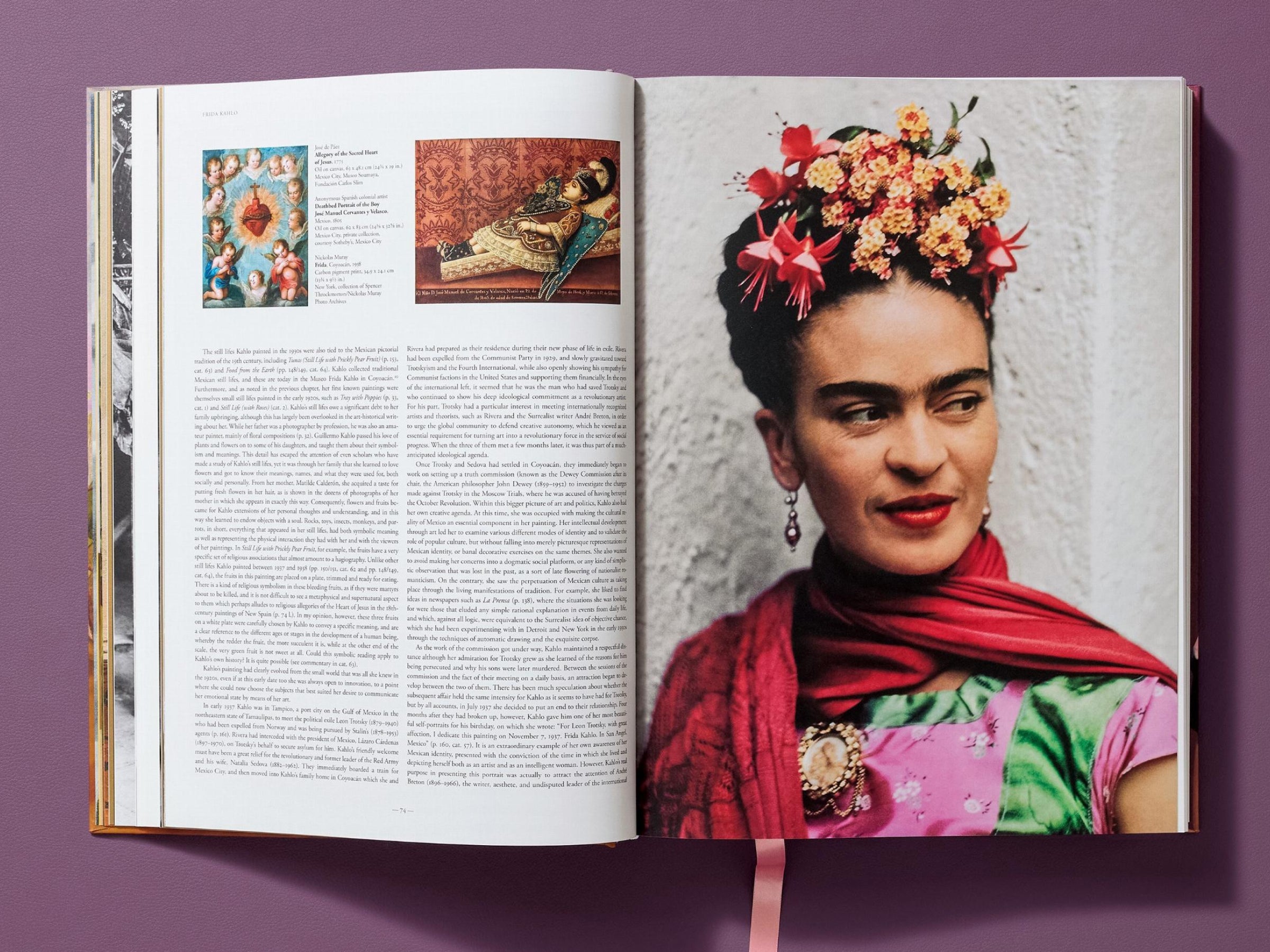 Interior spread from Frida Kahlo The Complete Paintings with thumbnails on the left and a large color portrait of Frida Kahlo in a floral dress on the right.