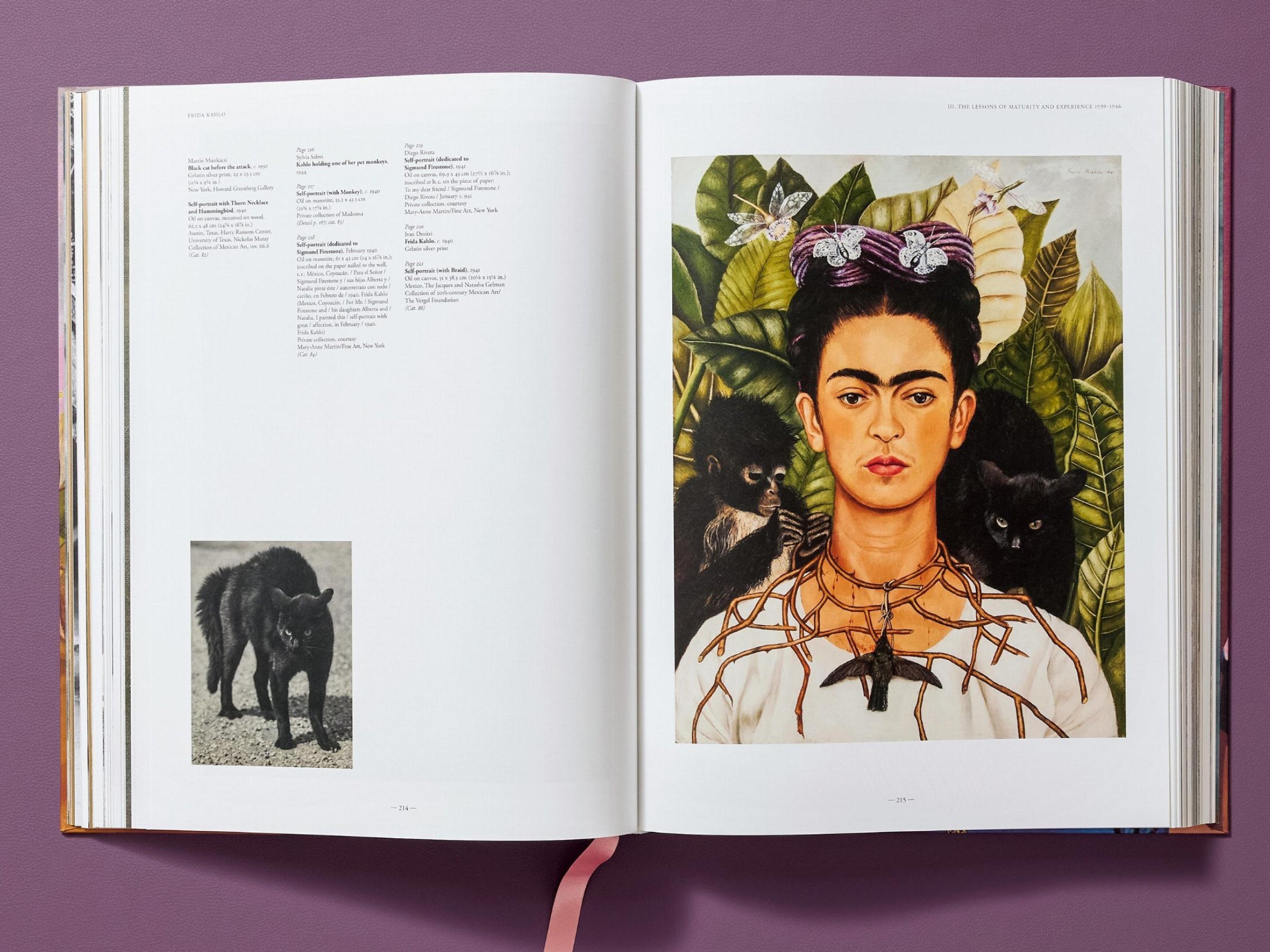 Two page spread from Frida Kahlo The Complete Paintings with a large vibrant portrait on the right page and a small black and white image on the left.