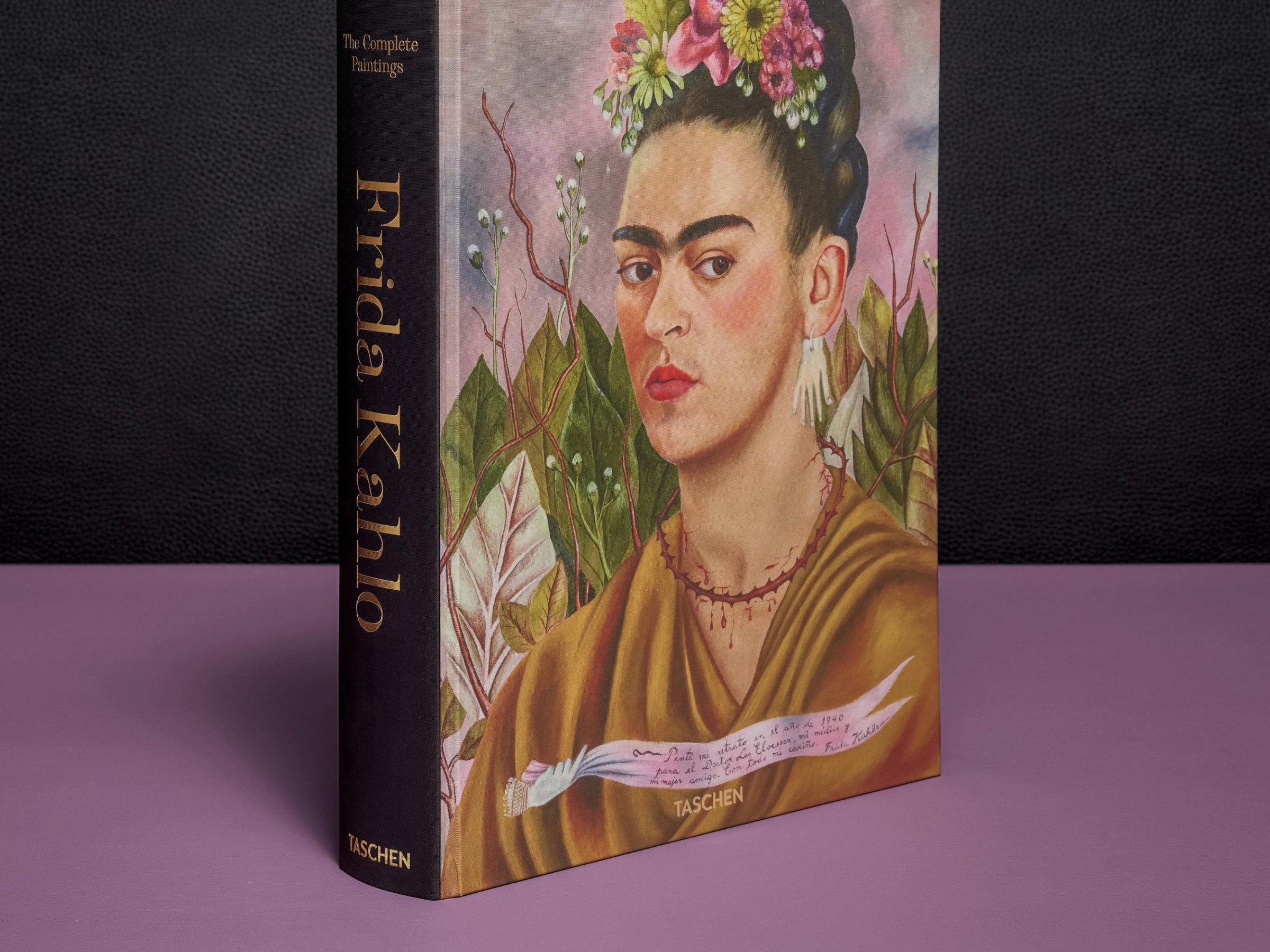 Frida Kahlo The Complete Paintings oversized edition cover featuring a Frida Kahlo portrait with a flower crown.