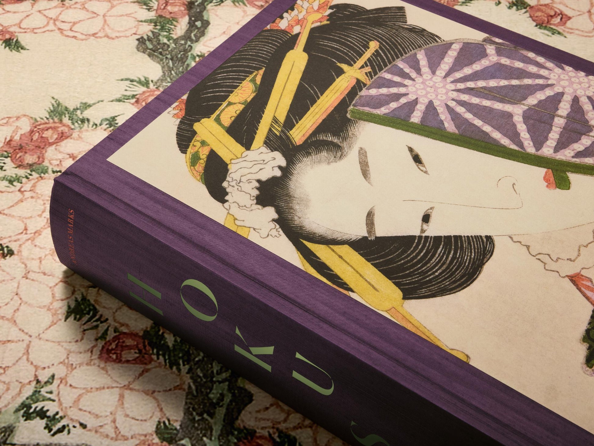 Purple edged Hokusai volume cover featuring a traditional Japanese portrait with elaborate hair ornaments