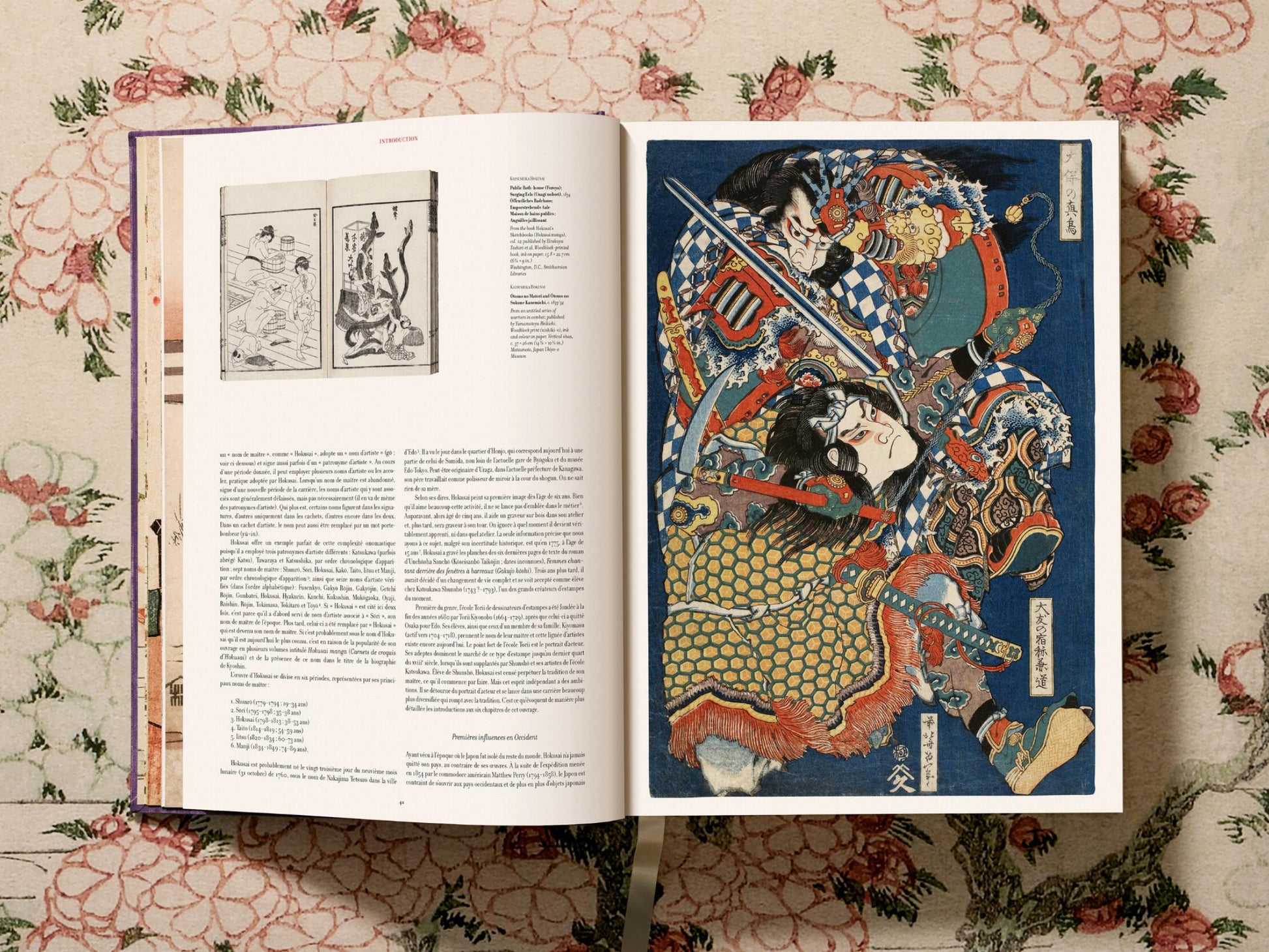 Spread from a Hokusai book showing a red Shunrō title page on the left and a bold warrior print on the right